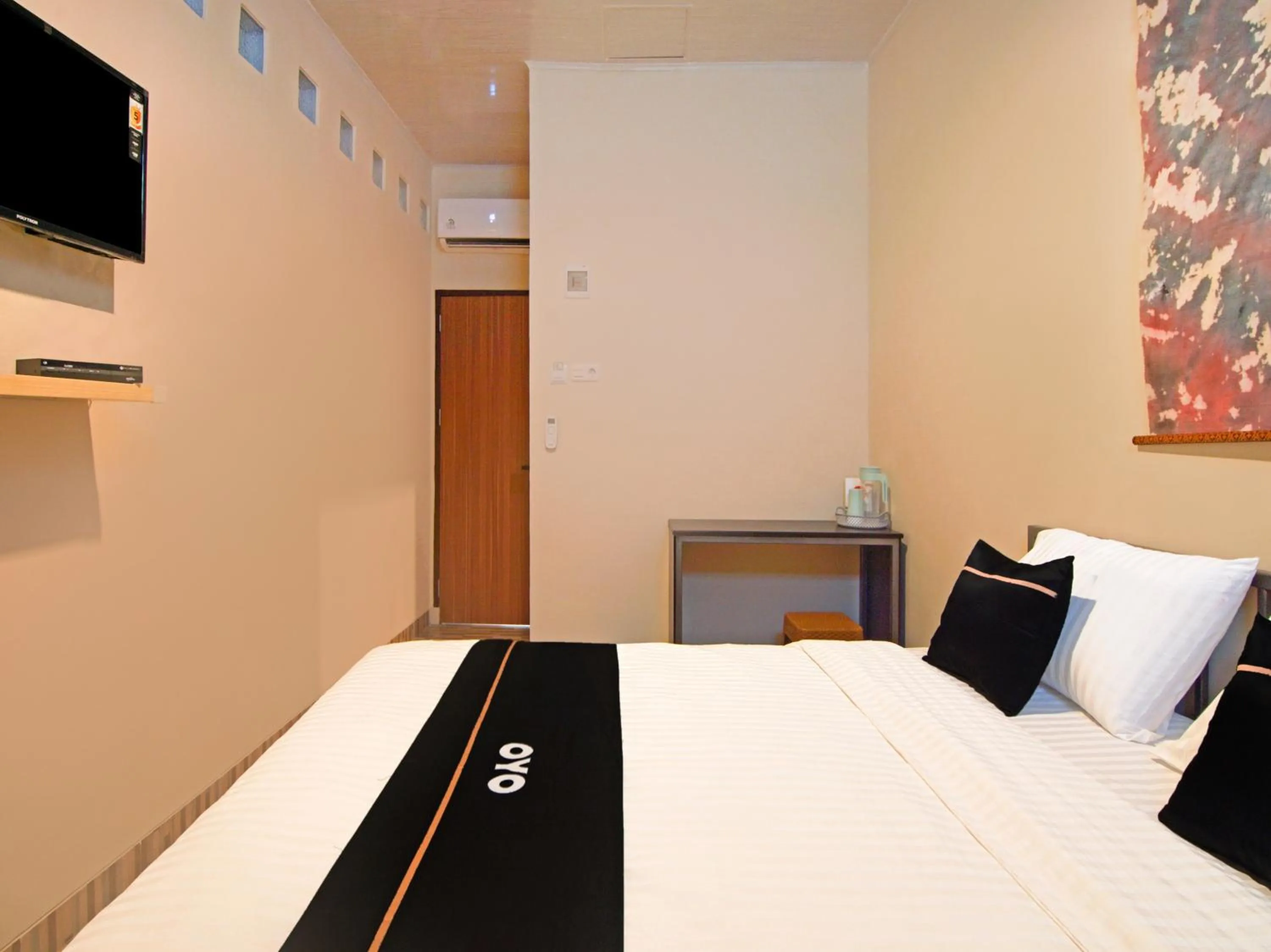 Bedroom in OYO 3606 Cendrawasih Resident