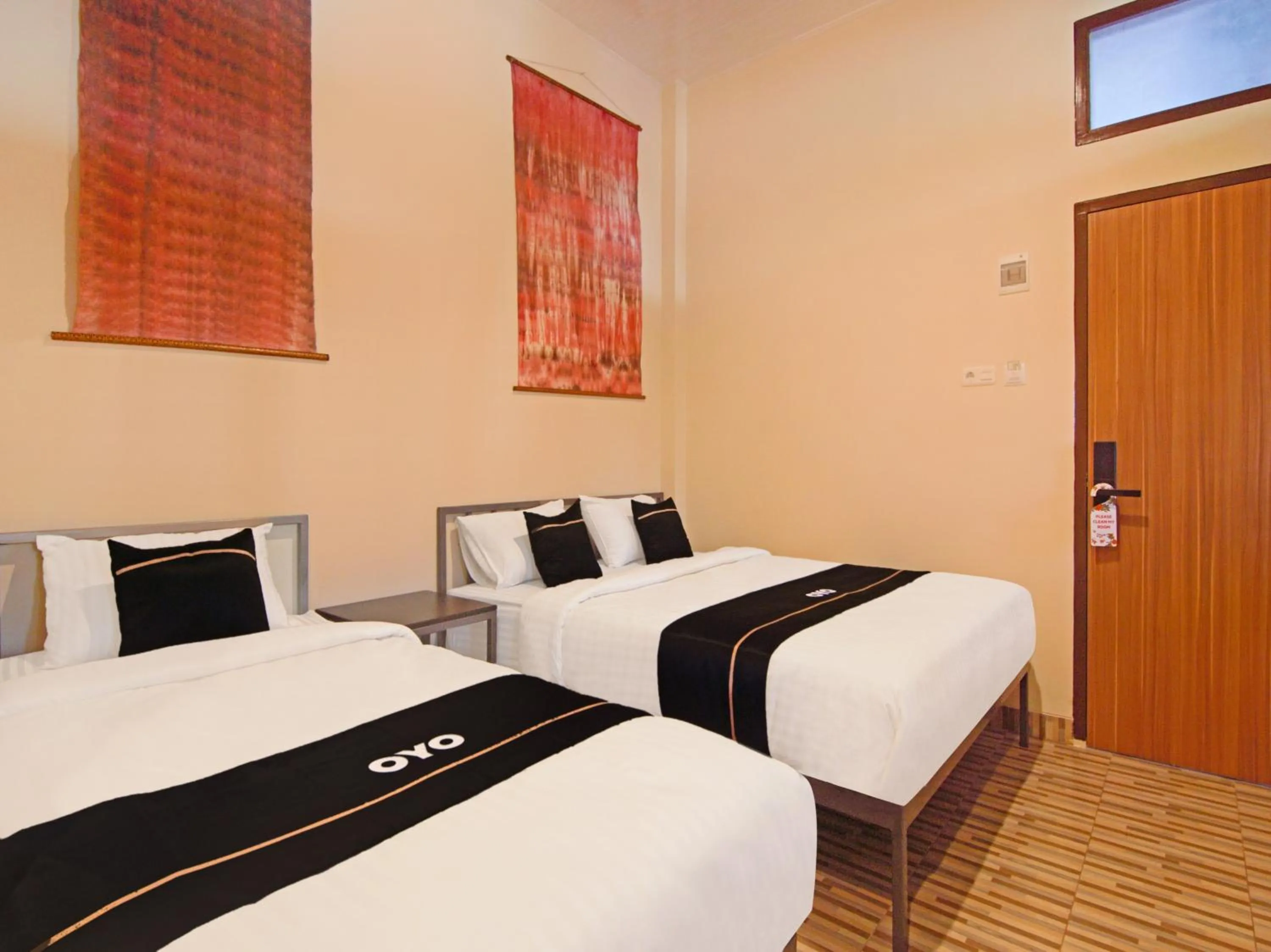 Bedroom in OYO 3606 Cendrawasih Resident