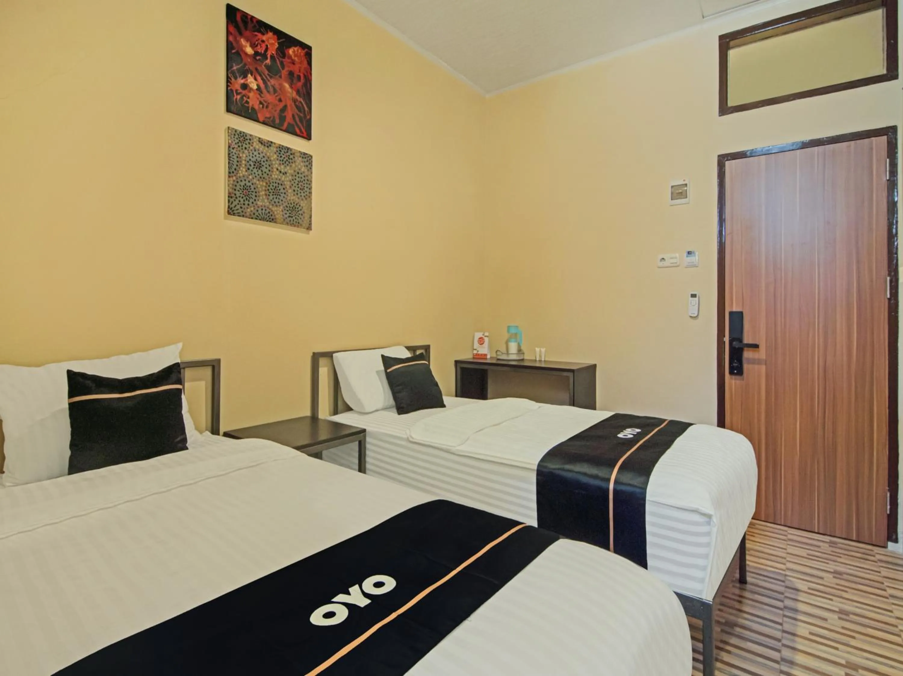 Bedroom in OYO 3606 Cendrawasih Resident