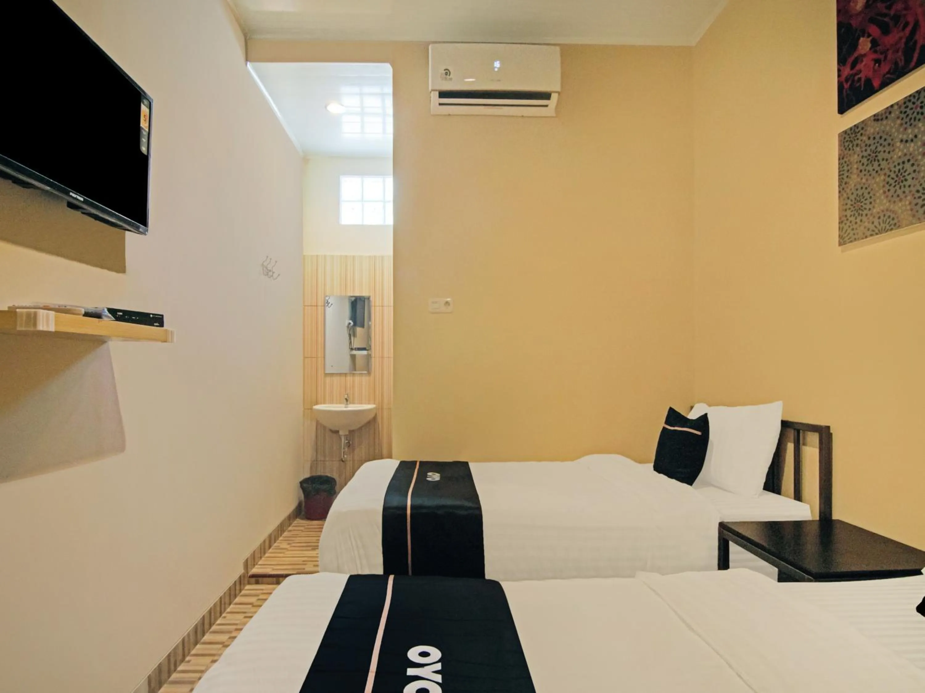 Bedroom in OYO 3606 Cendrawasih Resident