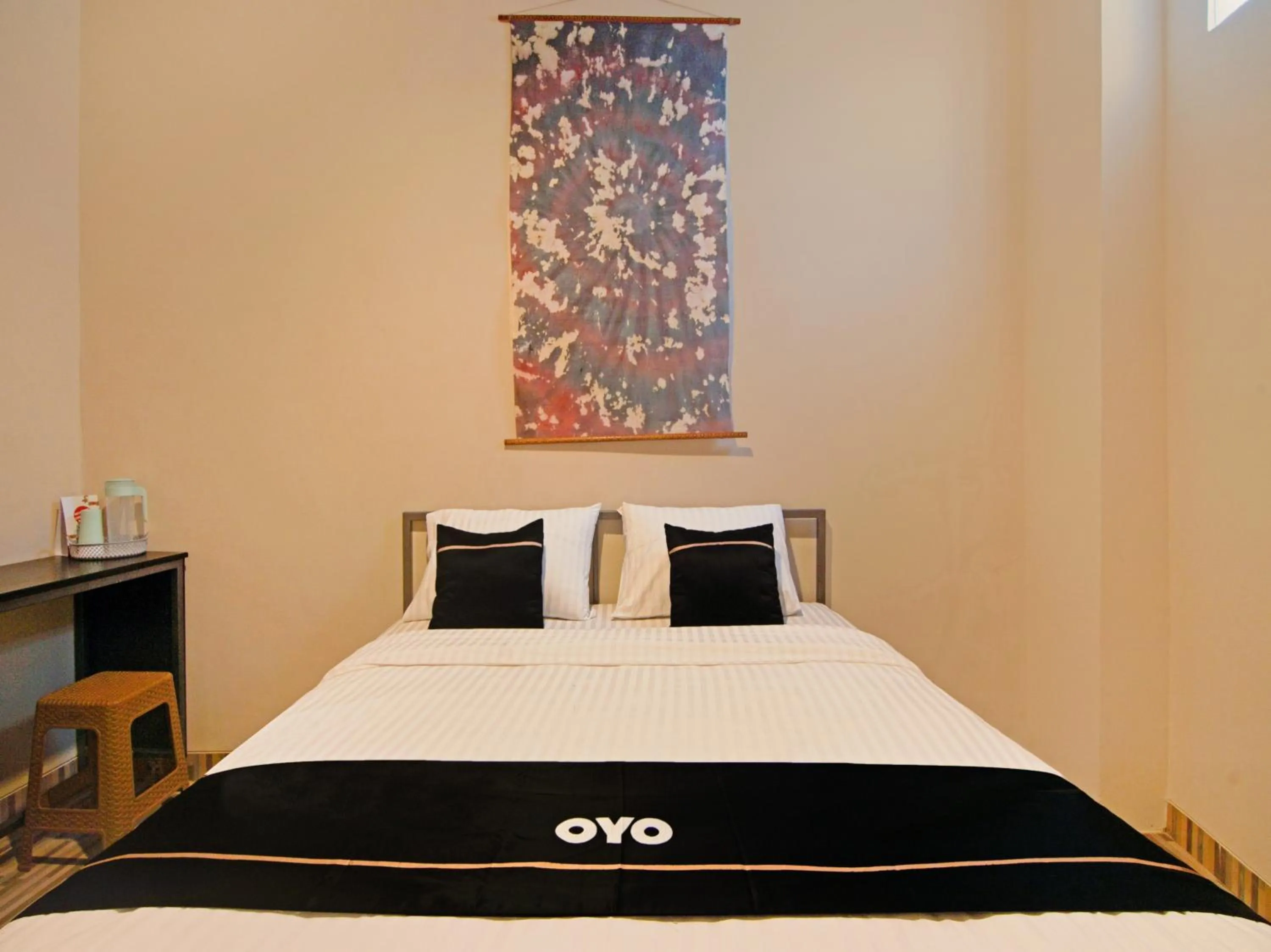 Bedroom in OYO 3606 Cendrawasih Resident