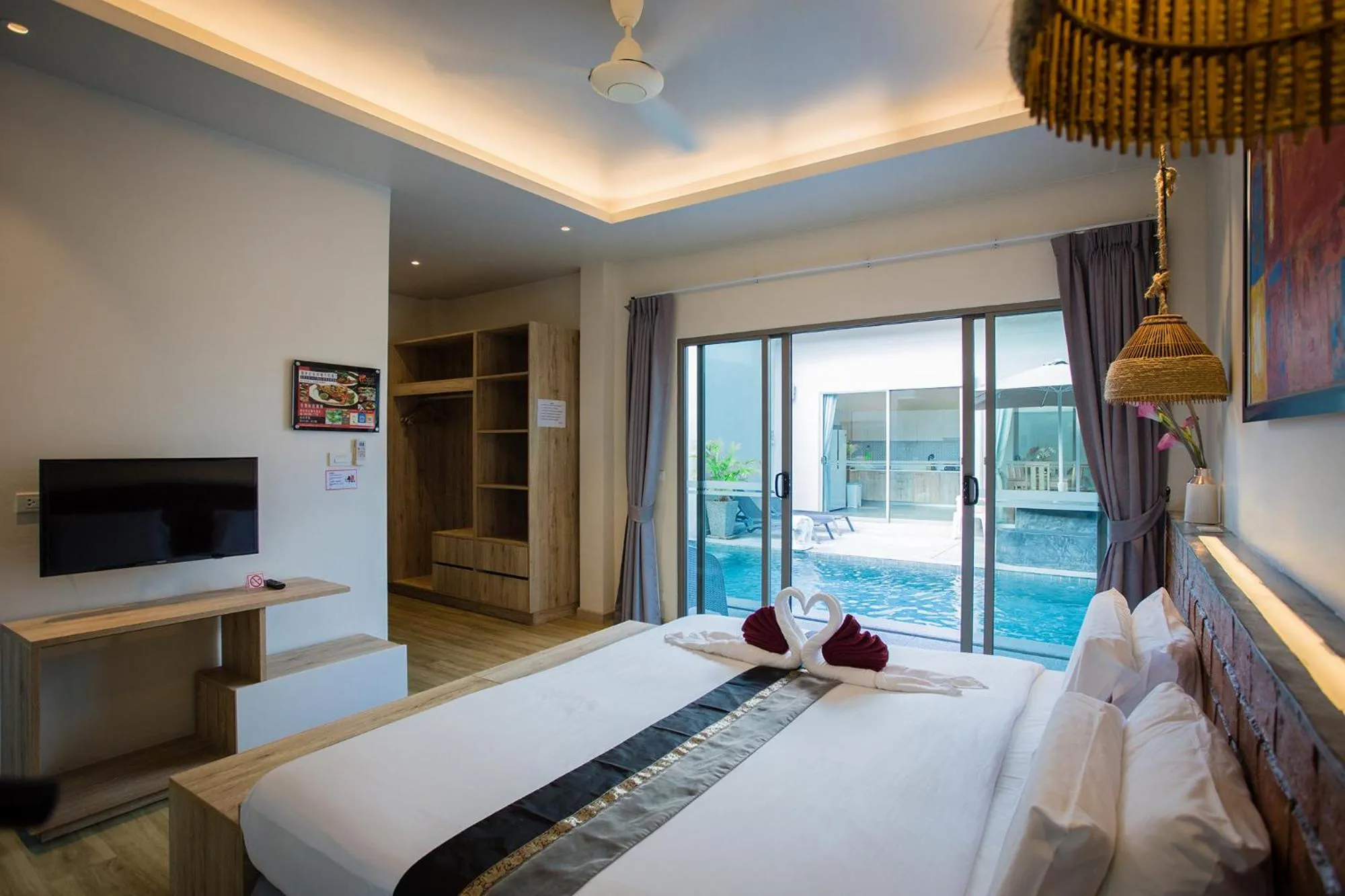 Photo of the whole room, Bed in Yipmunta Pool Villa - SHA Plus Certified