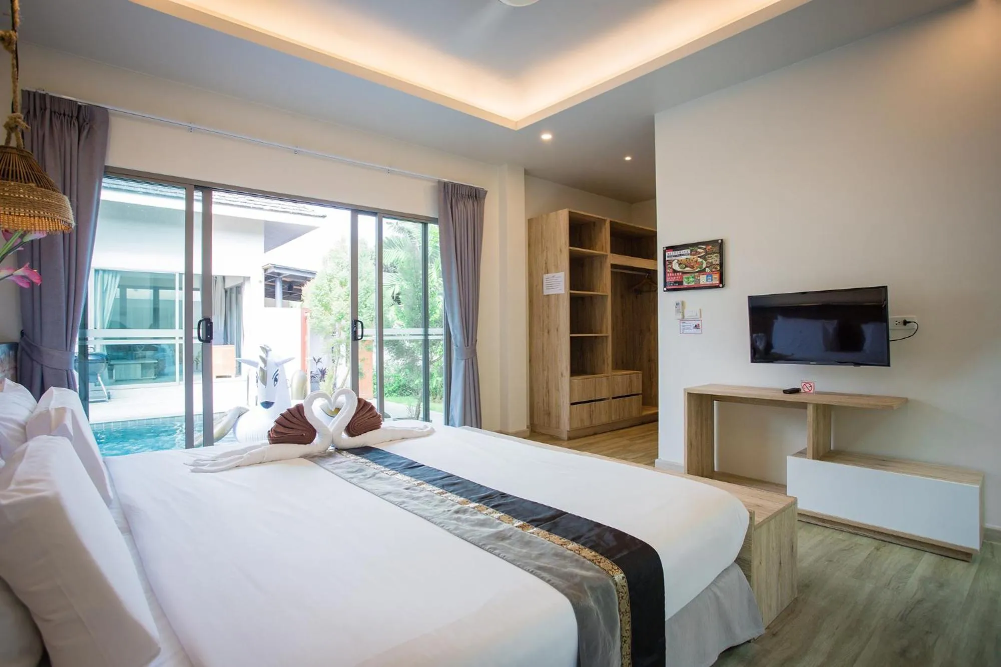 Photo of the whole room, Bed in Yipmunta Pool Villa - SHA Plus Certified