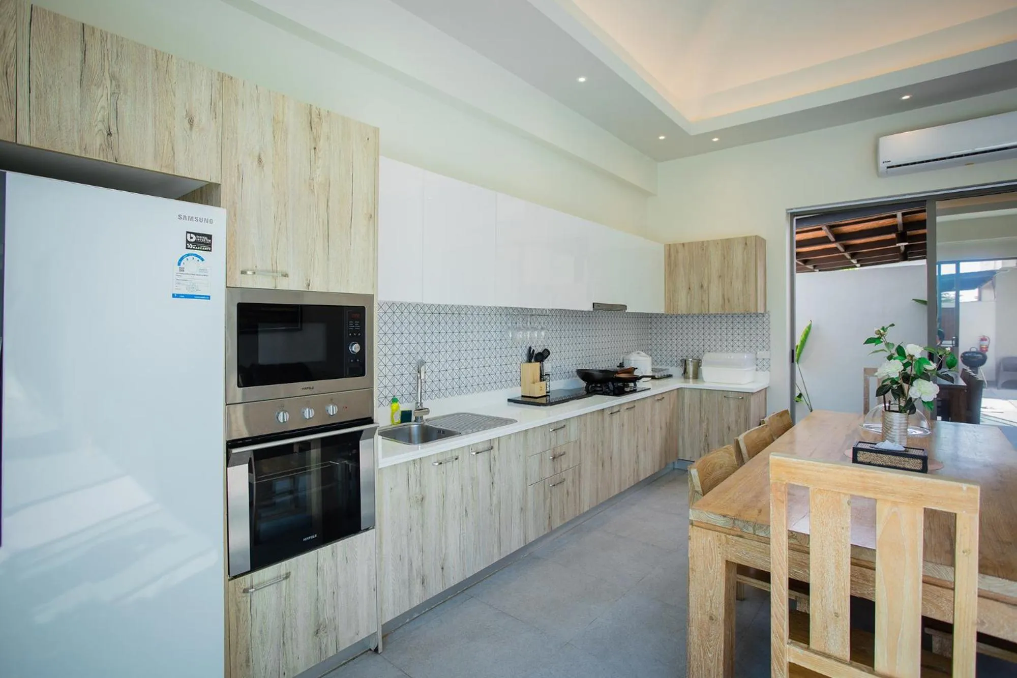 Kitchen or kitchenette in Yipmunta Pool Villa - SHA Plus Certified