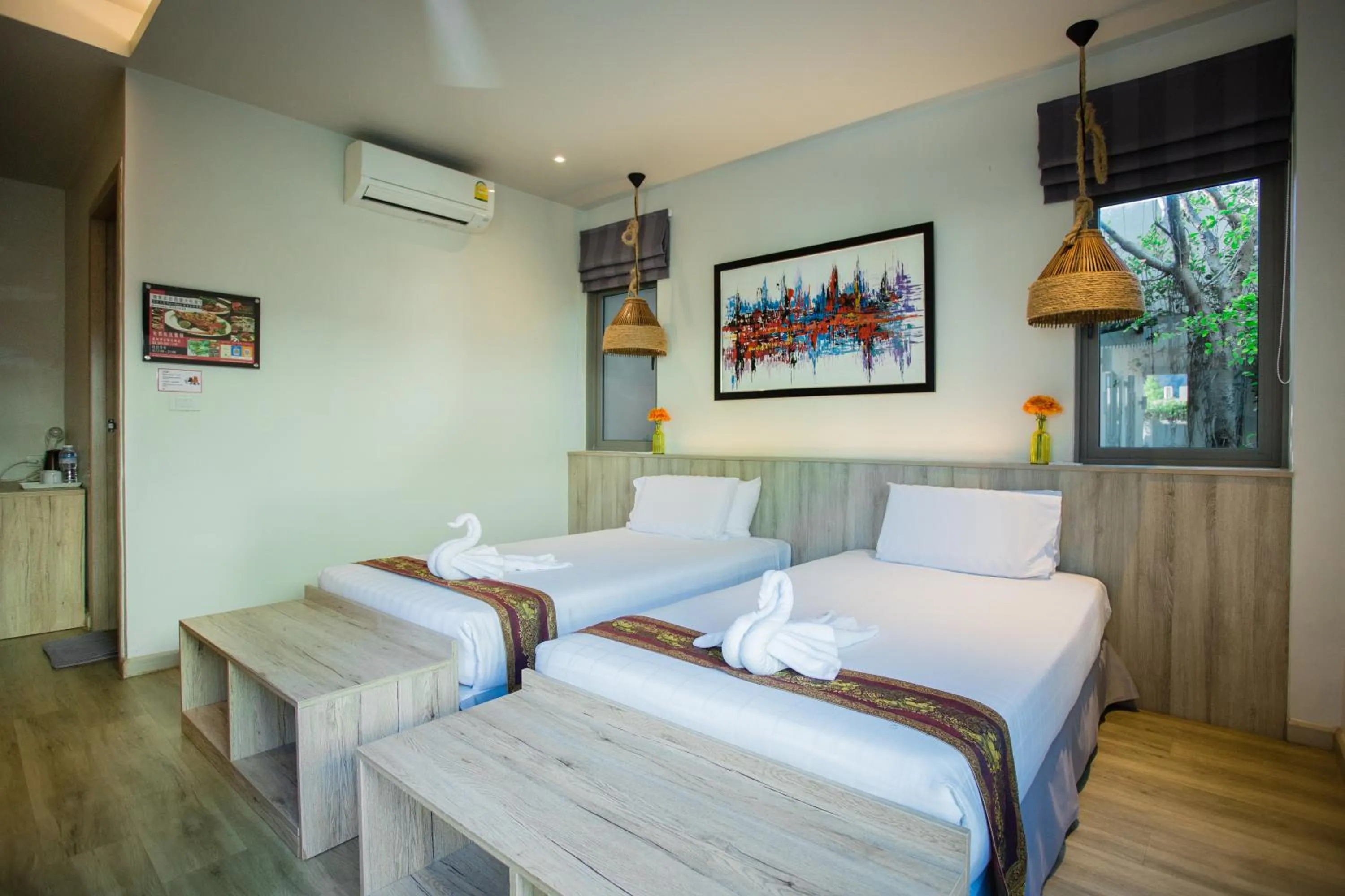 Bed in Yipmunta Pool Villa - SHA Plus Certified