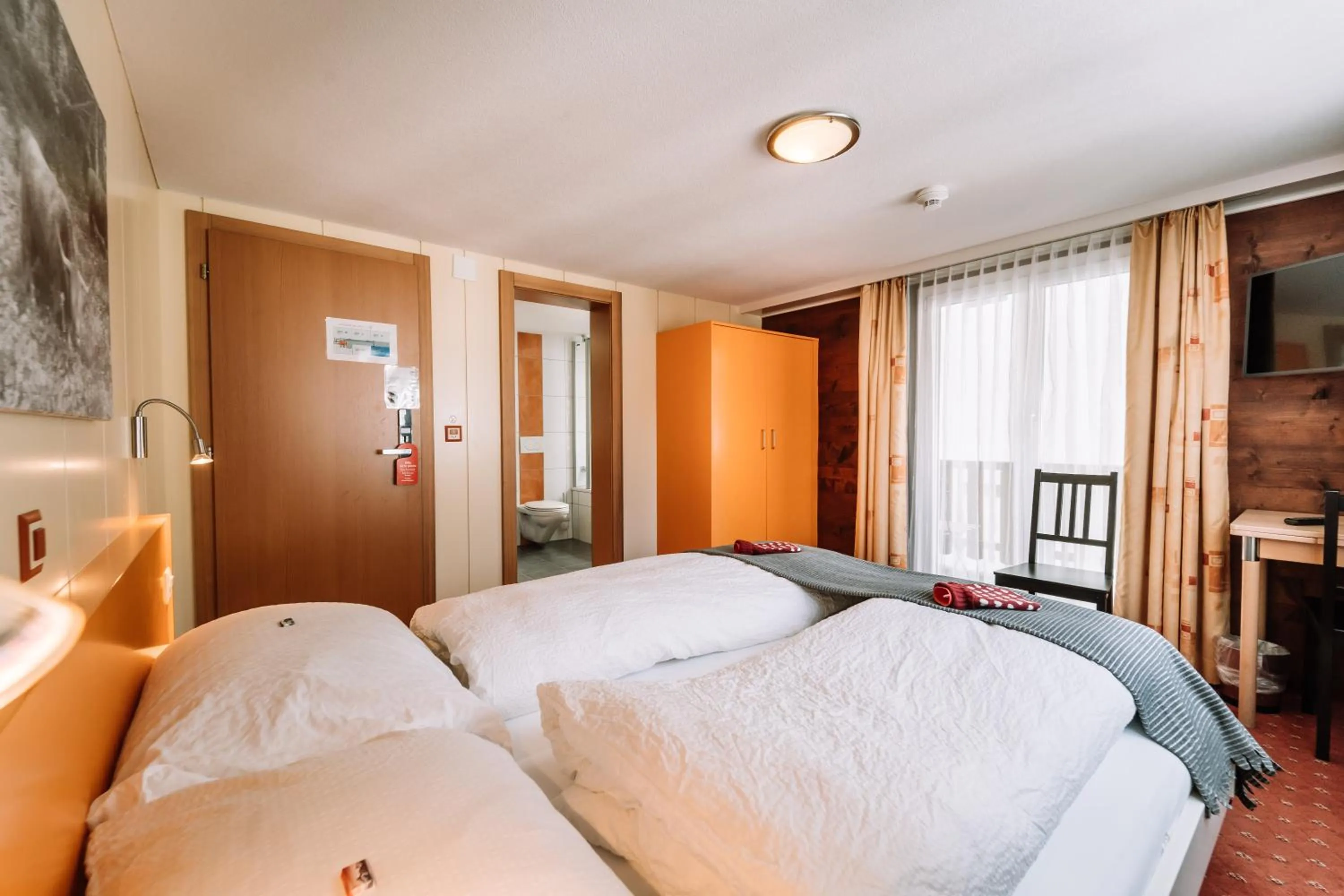 Bed in Hotel Les Amis