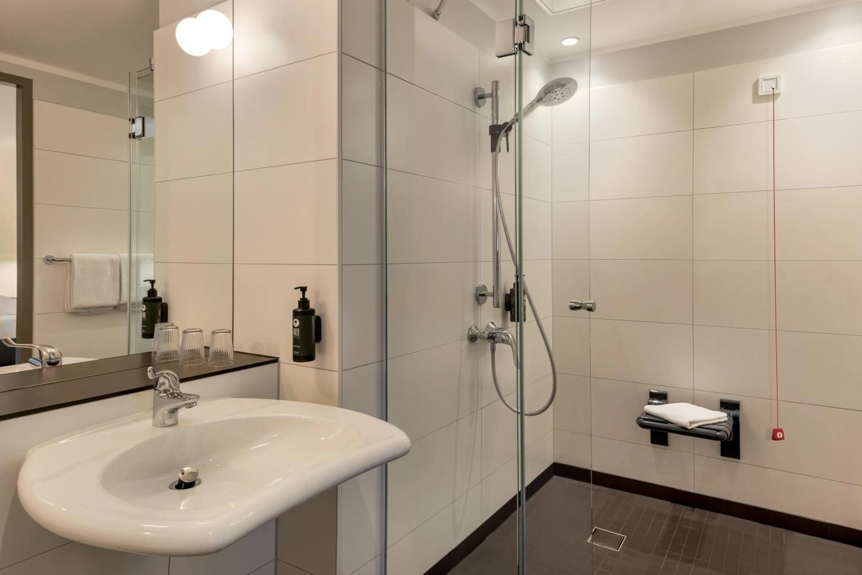 Bathroom in Vienna House Easy by Wyndham Leipzig