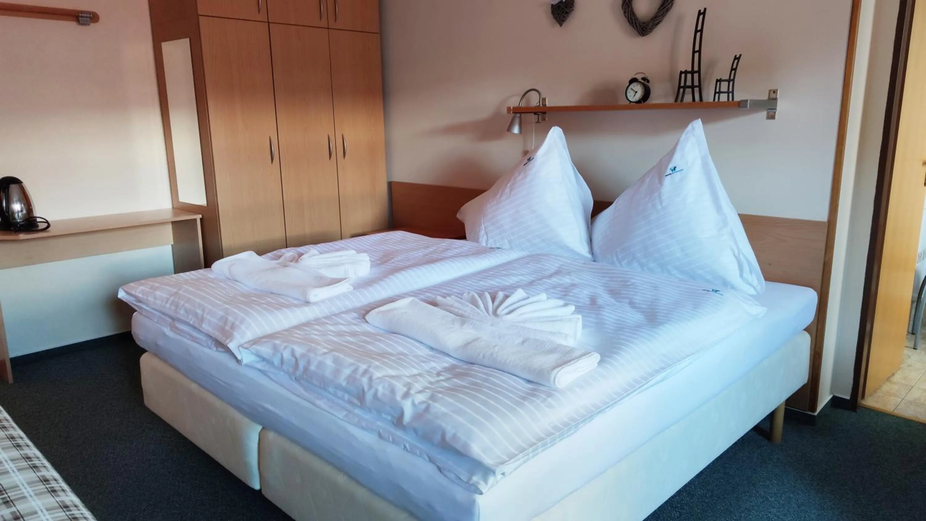 Bed in Hotel Modrásek