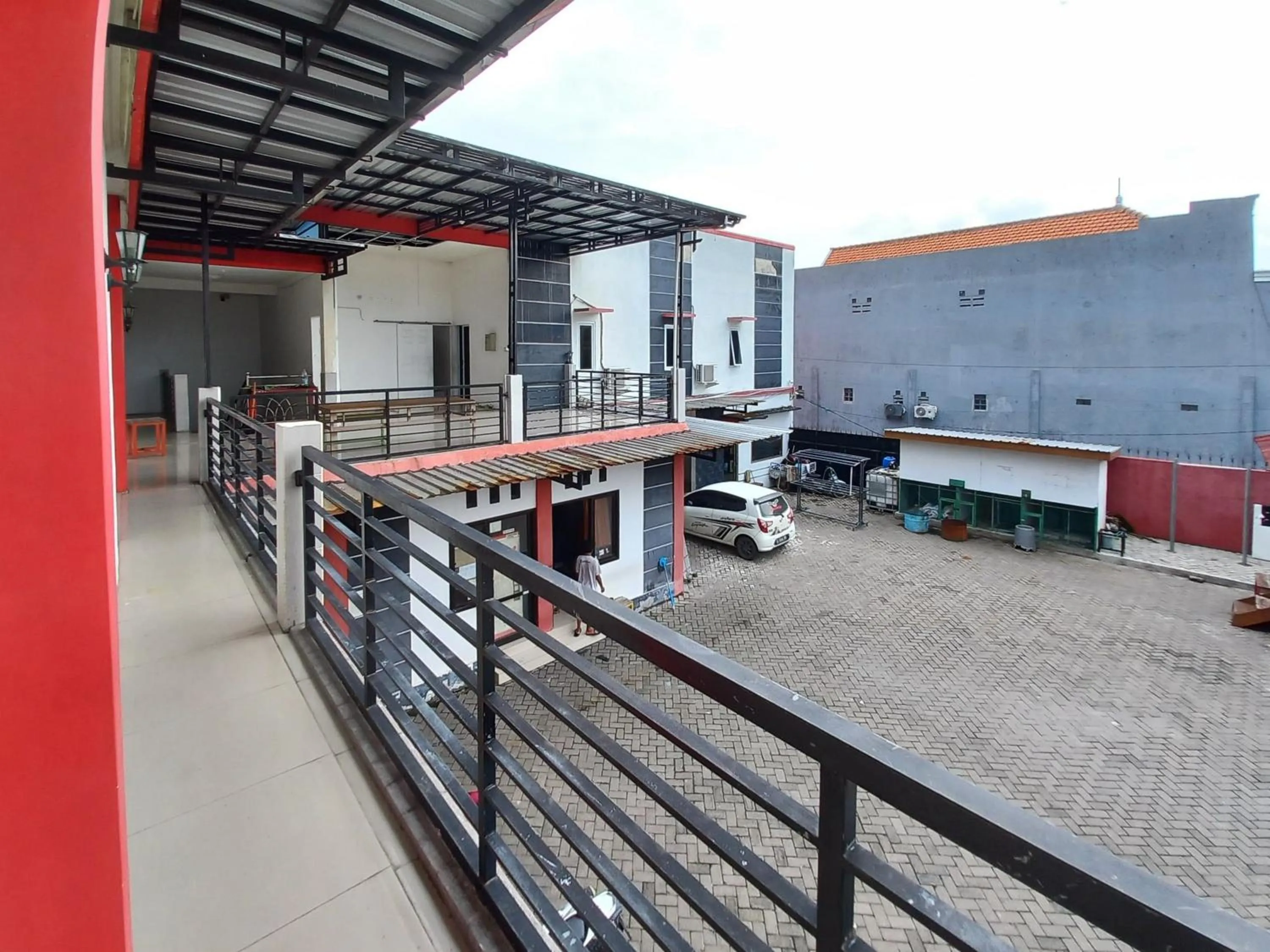 Property building in RedDoorz Syariah at Homestay Bougenville near Taman Alun-Alun Kota Lamongan