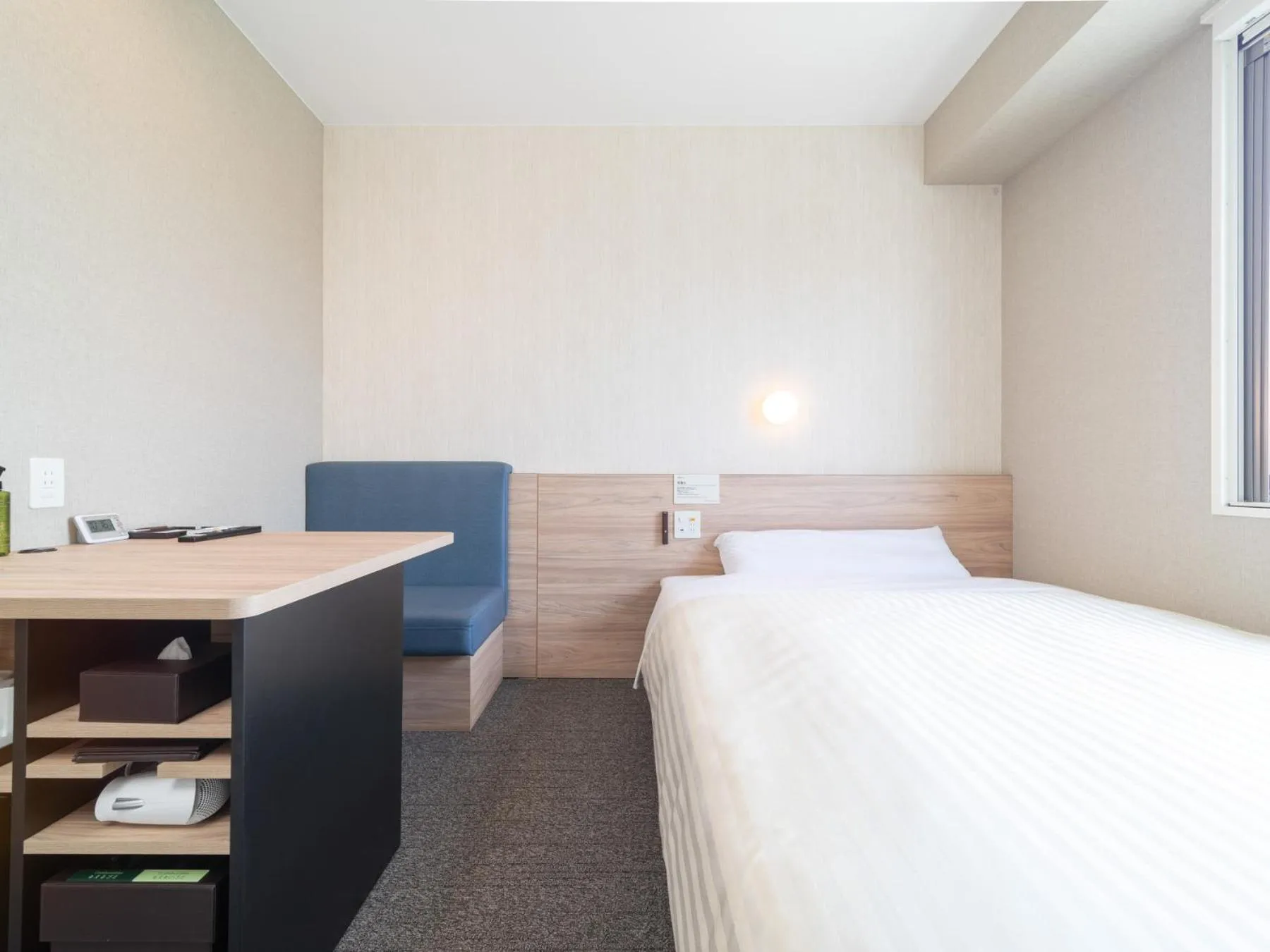 Bed in Super Hotel Iyo Saijo