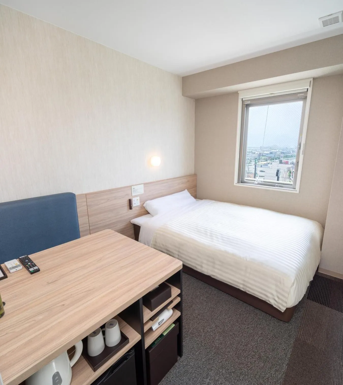 Bed in Super Hotel Iyo Saijo