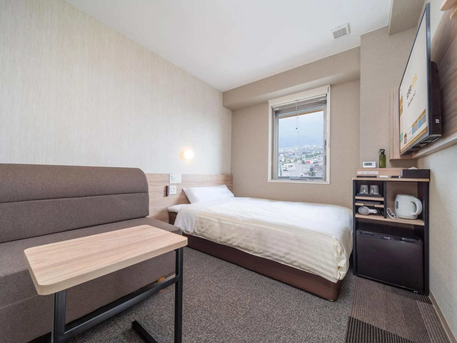 Bed in Super Hotel Iyo Saijo