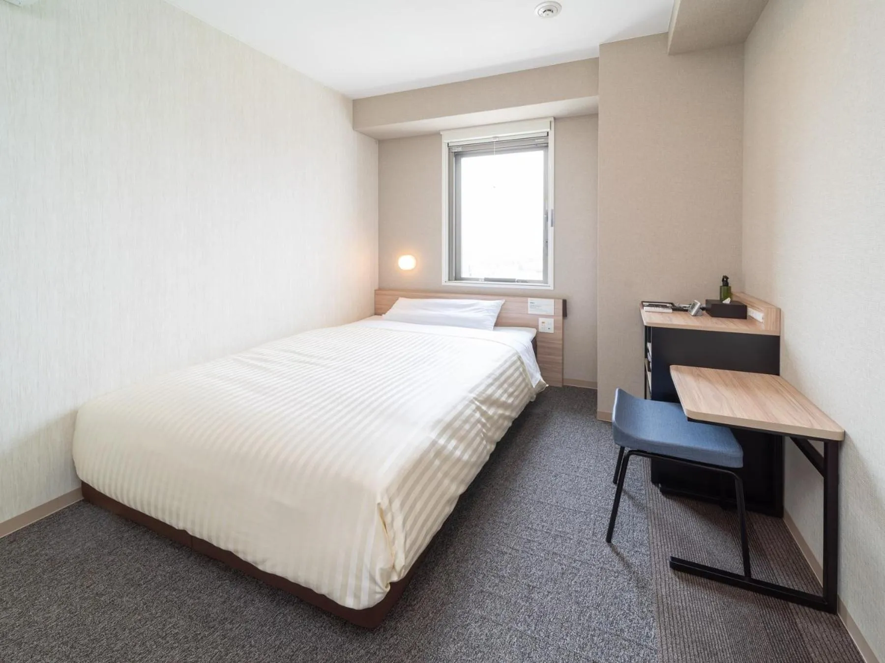 Bed in Super Hotel Iyo Saijo