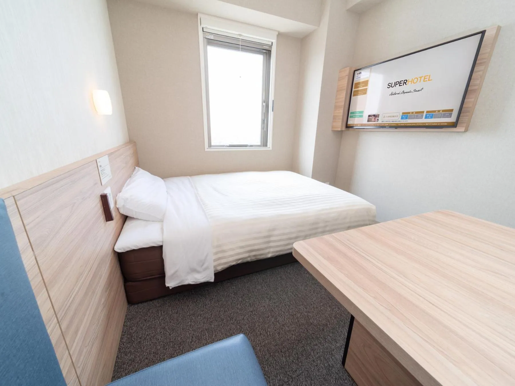 Bed in Super Hotel Iyo Saijo