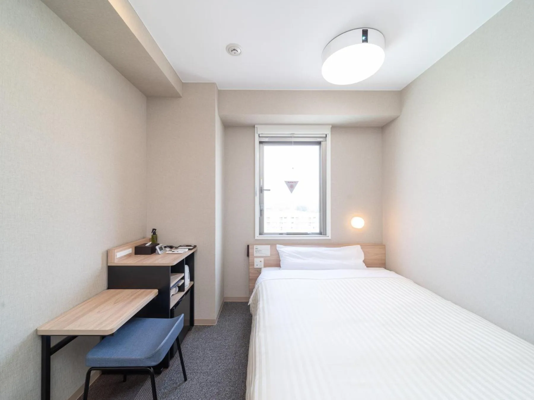 Bed in Super Hotel Iyo Saijo