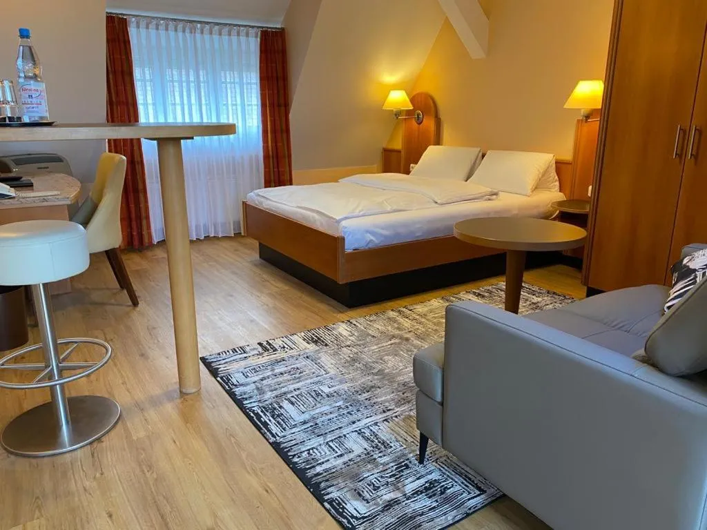 Bed in Apartment Hotel KRAL - BUSINESS HOTEL & SERVICED APARTMENTS