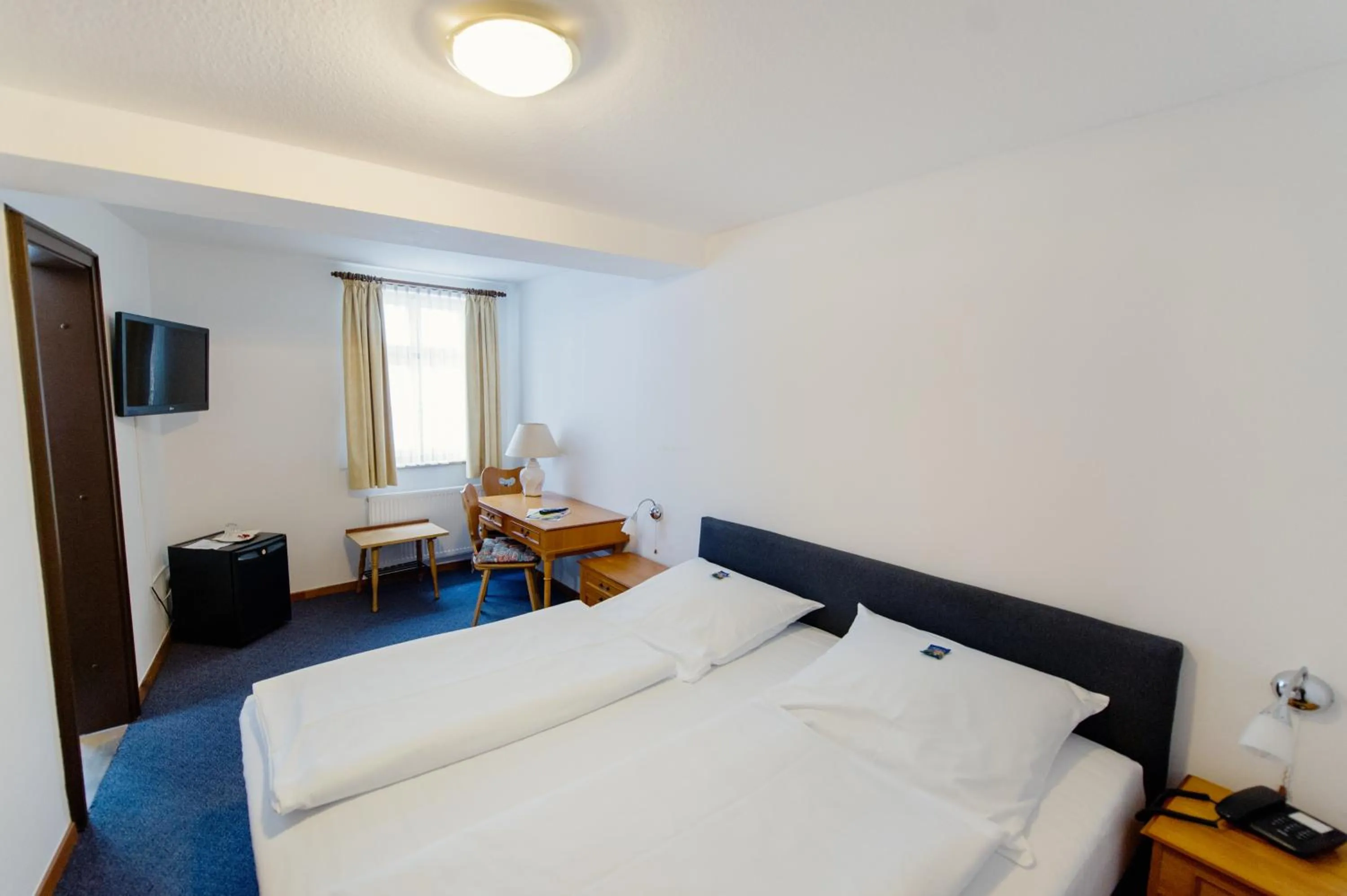 Photo of the whole room, Bed in Hotel Alt-Ringlein