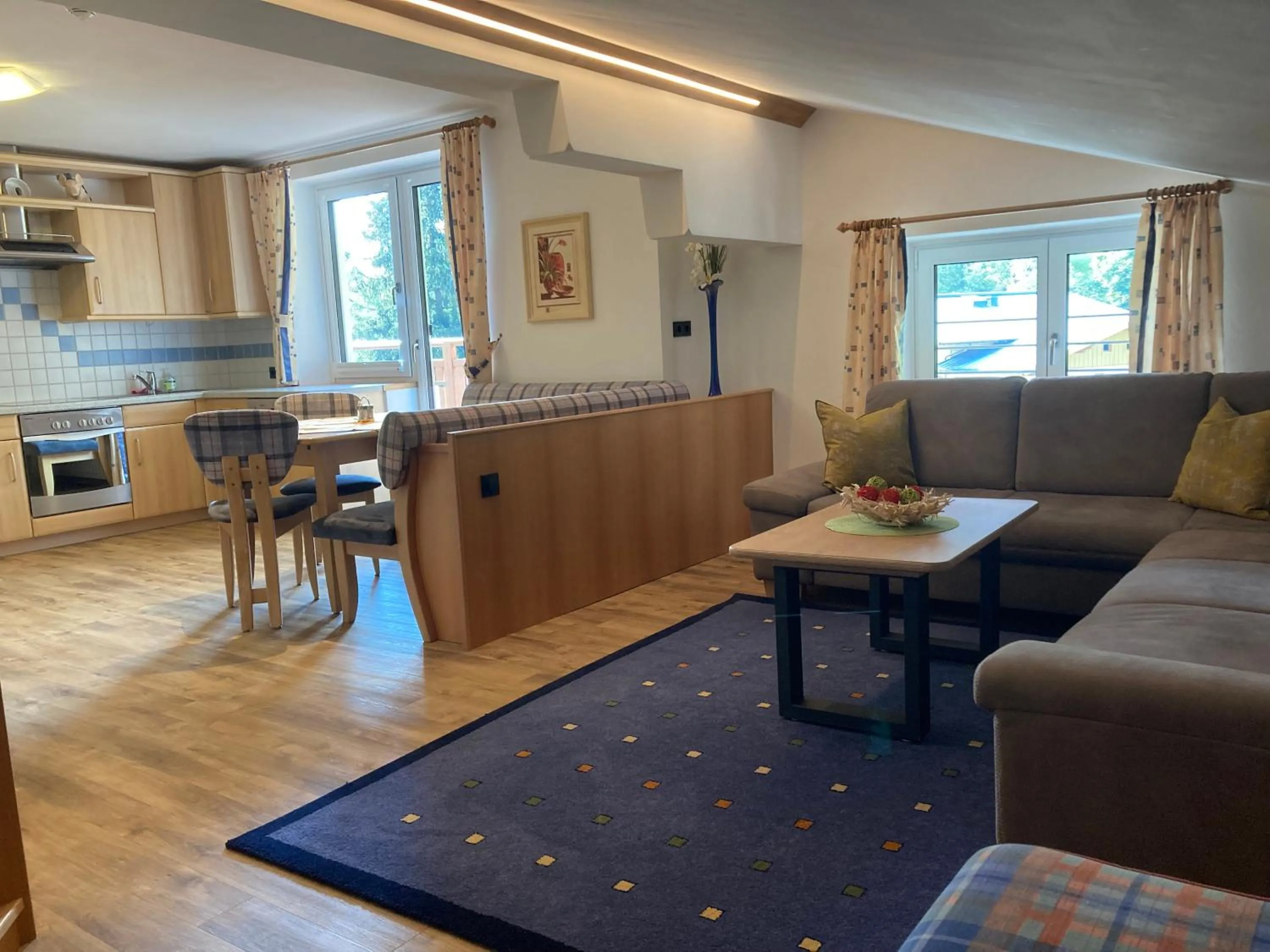 Living room in Hotel Garni Siegmundshof - inclusive Joker Card im Sommer