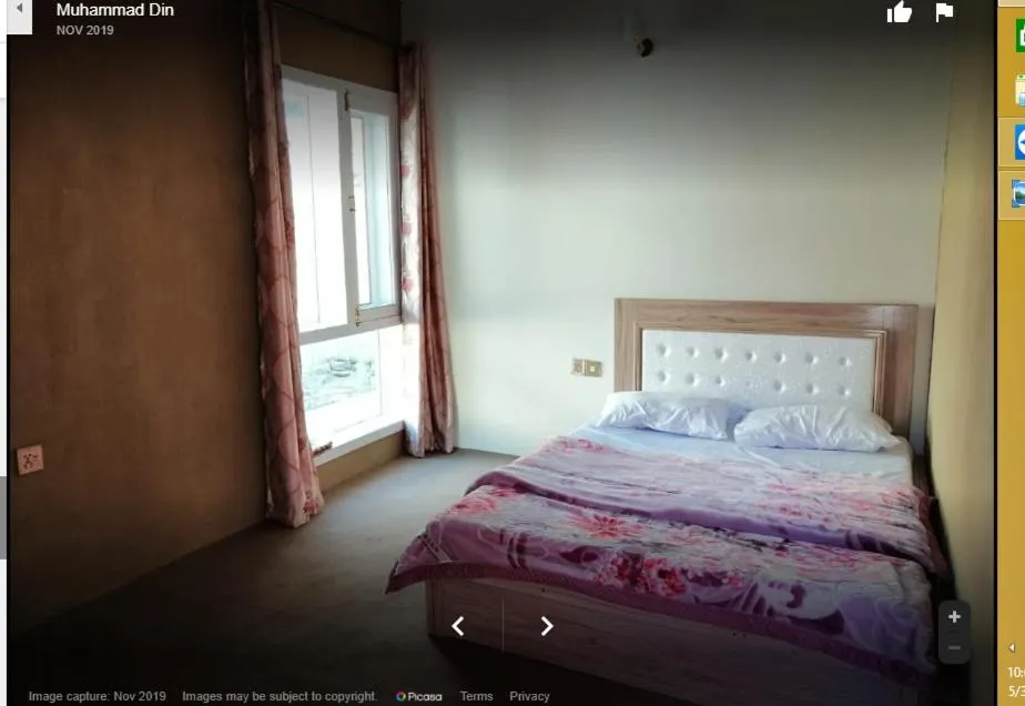 Bed in Darwesh Hotel Hunza