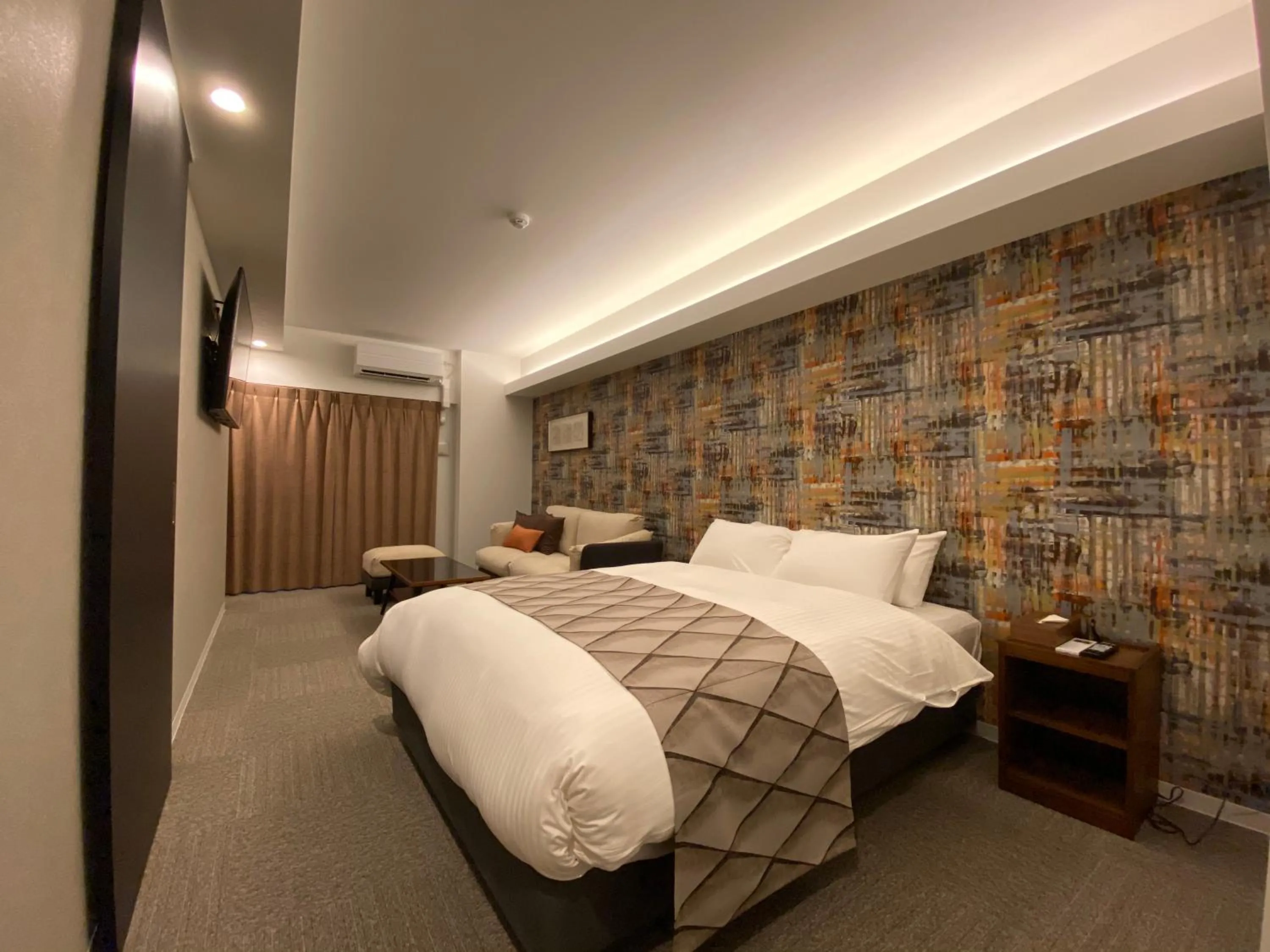 Bedroom, Bed in Randor Residential Hotel Fukuoka Classic