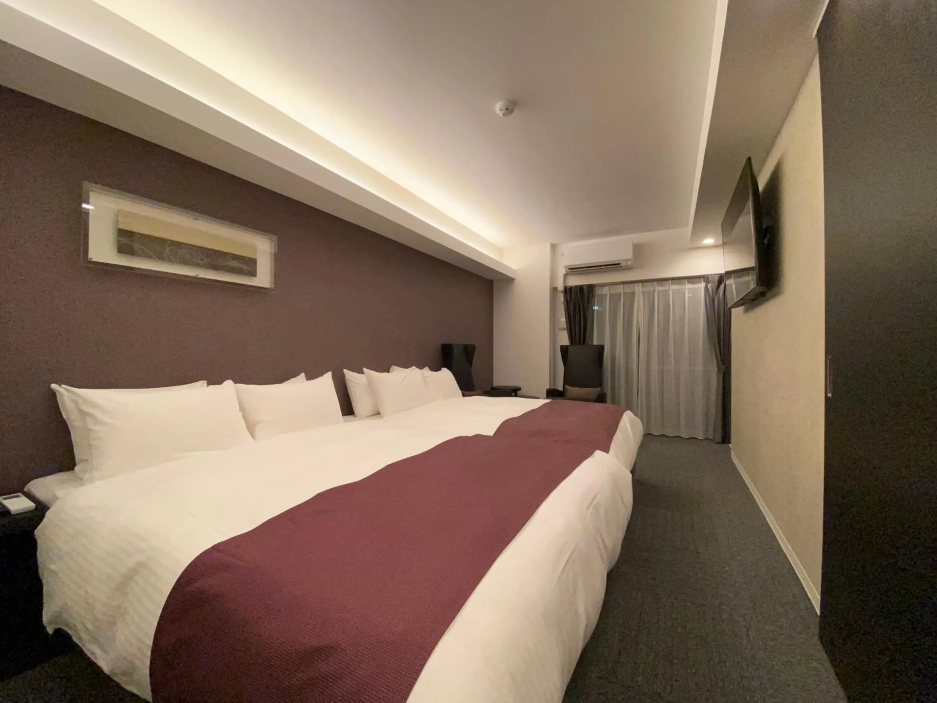 Bedroom, Bed in Randor Residential Hotel Fukuoka Classic