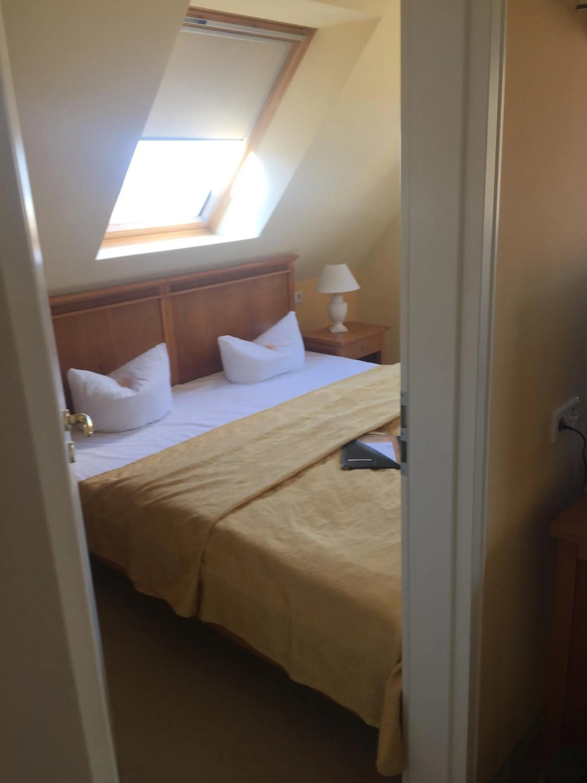 Photo of the whole room, Bed in Strandhotel Deichgraf Graal-Müritz