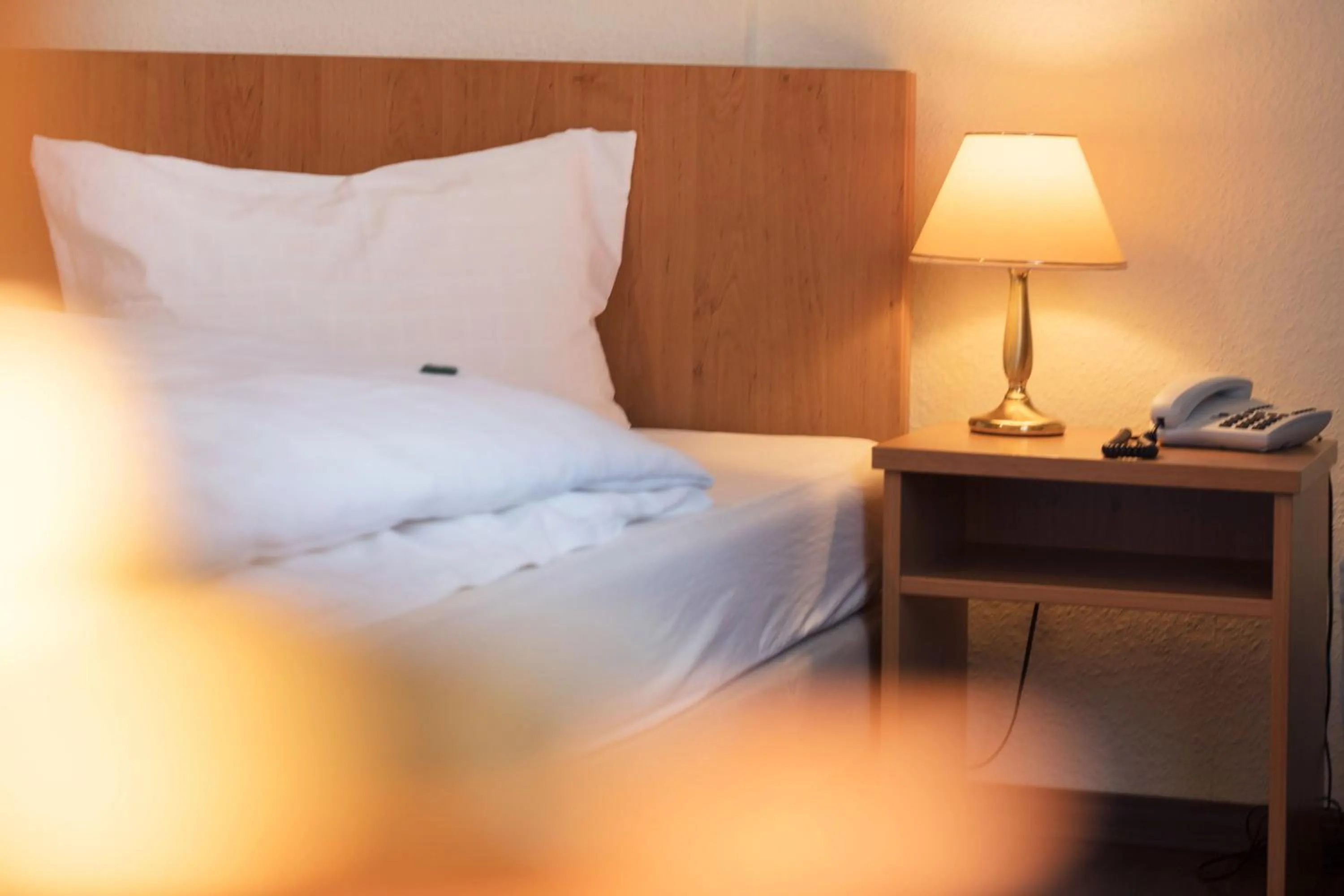 Photo of the whole room, Bed in Hotel Markgräfler Hof