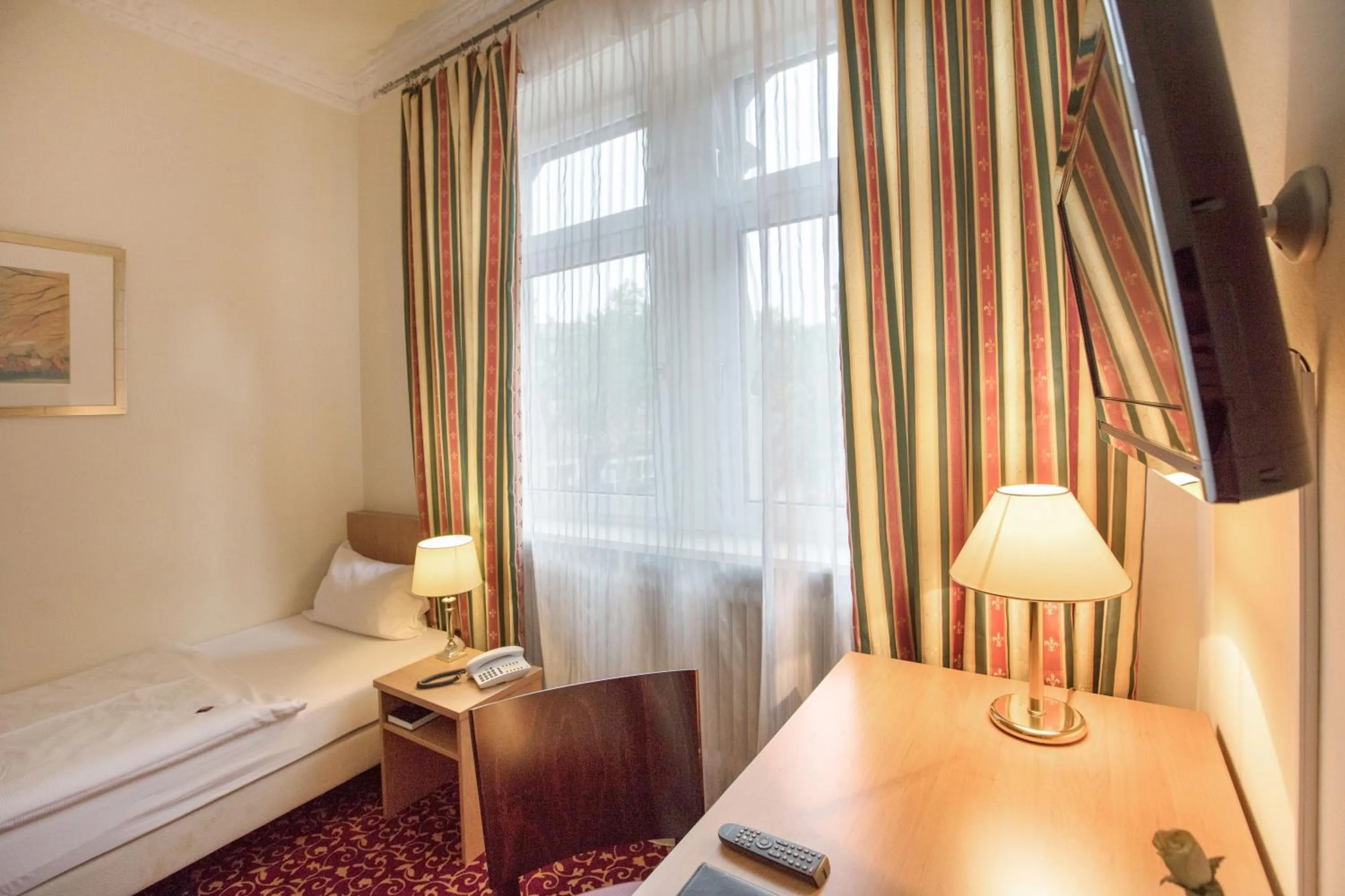 Photo of the whole room, Bed in Hotel Markgräfler Hof