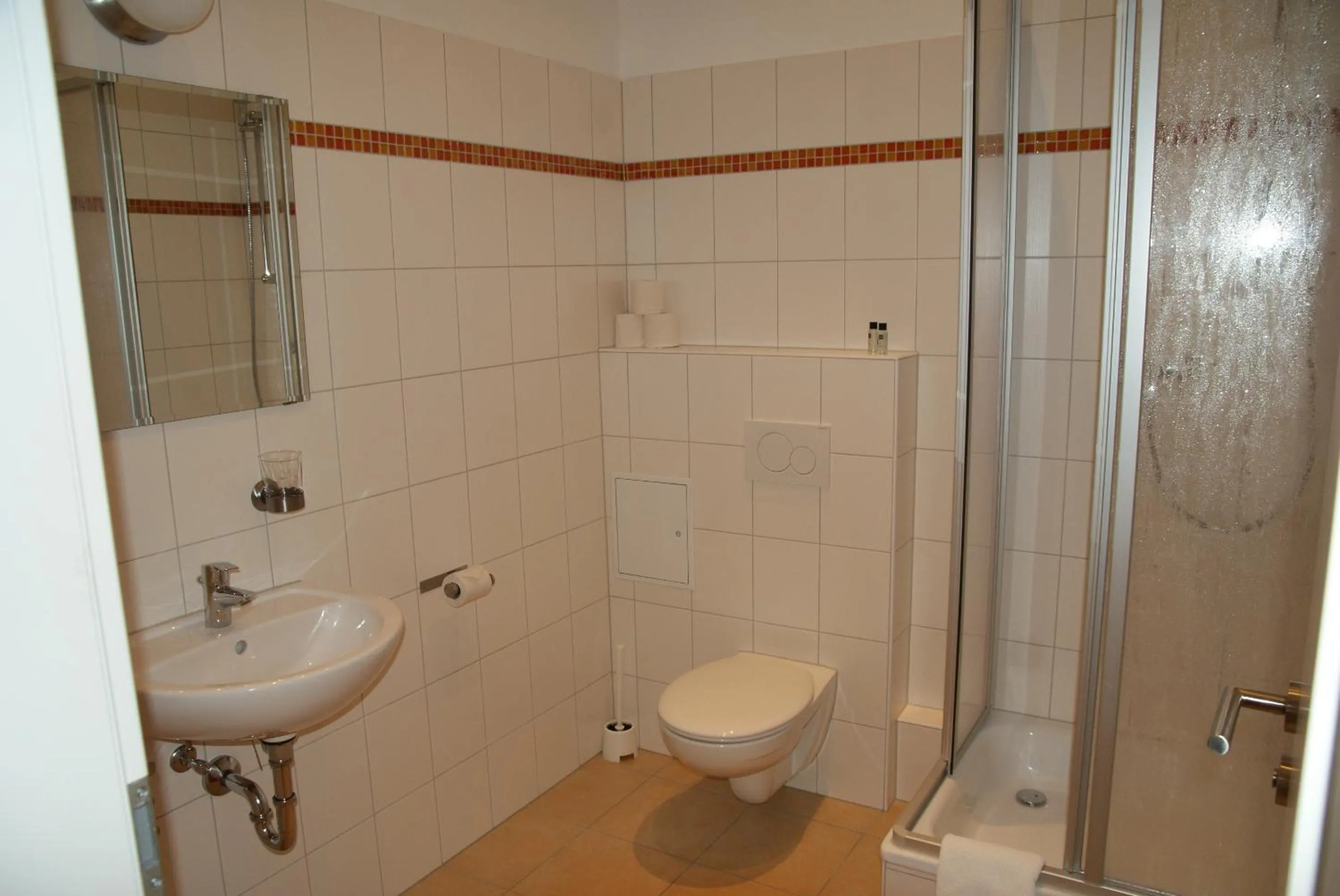 Bathroom in Happy Go Lucky Hotel + Hostel