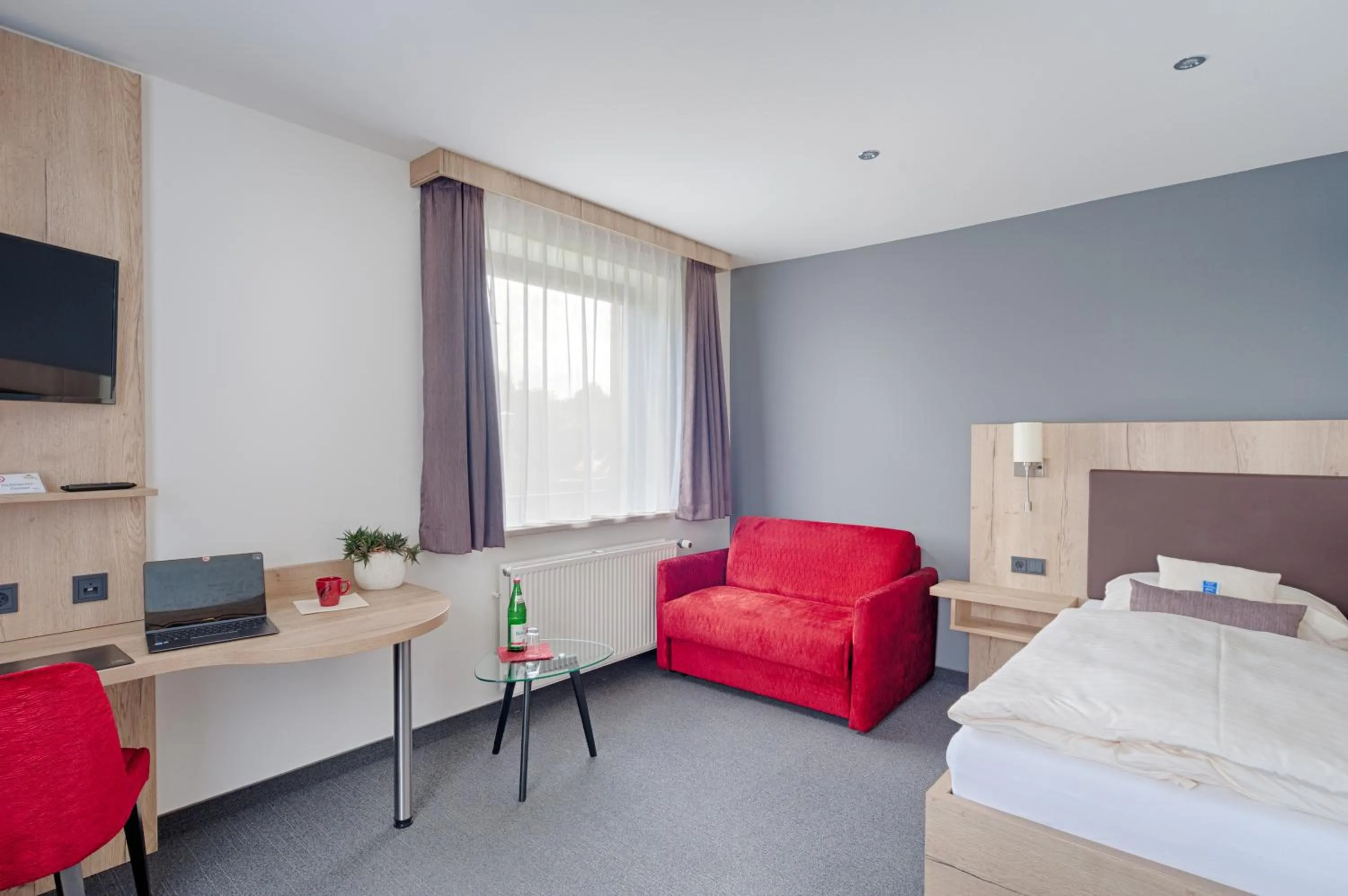 Photo of the whole room, Bed in Akzent Hotel Cordes & Restaurant am Rosengarten