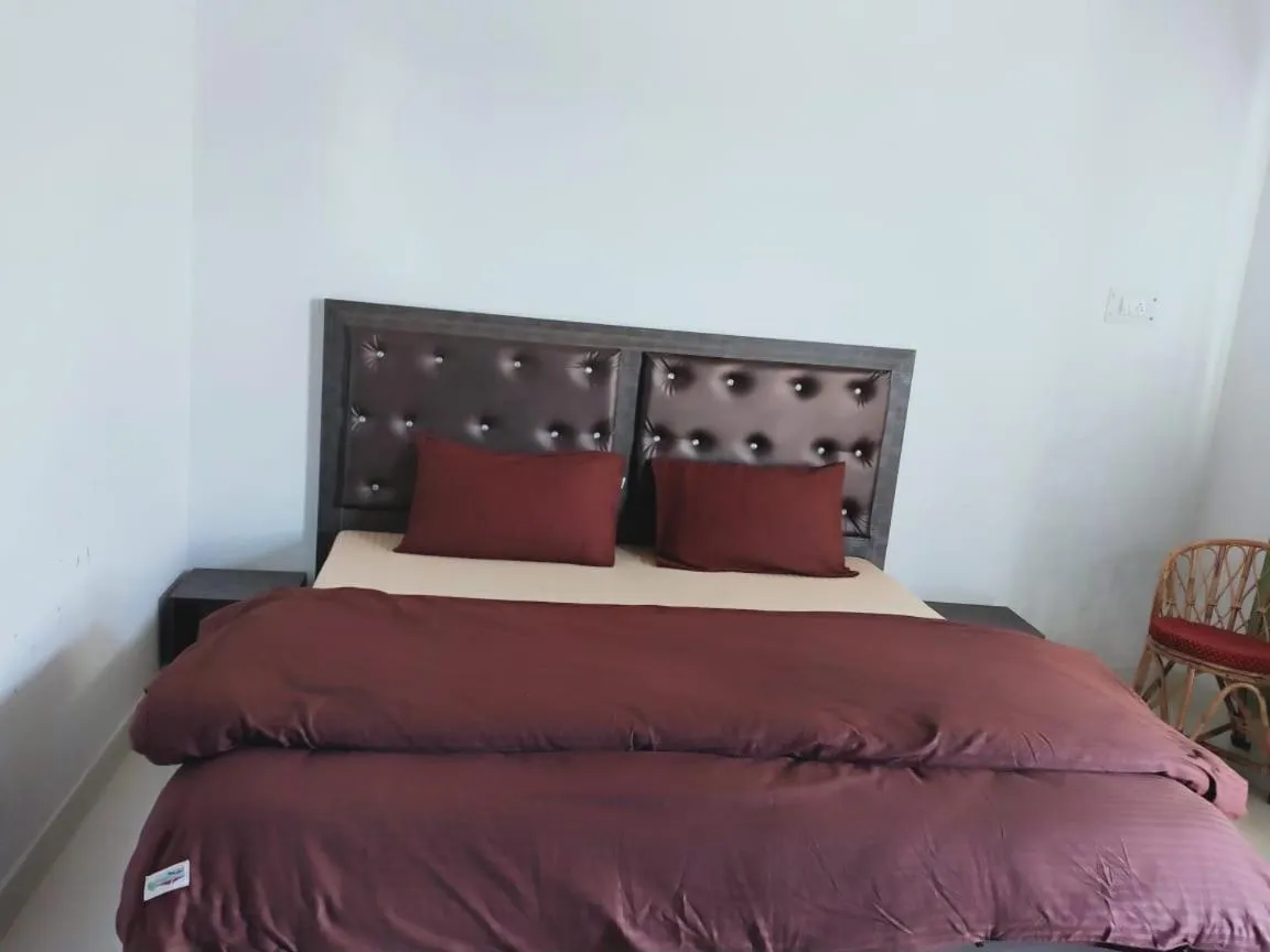 Bed in Pahadi Ghar Homestay