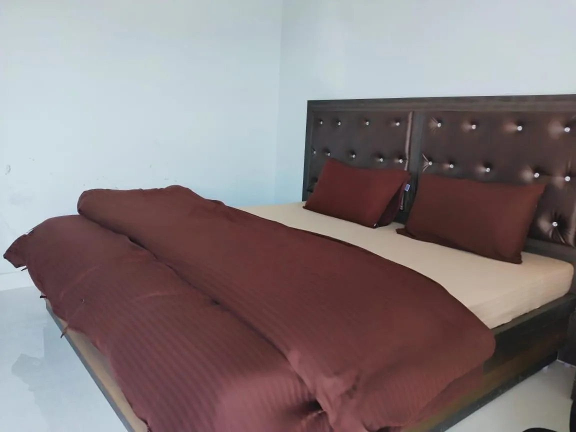Bed in Pahadi Ghar Homestay