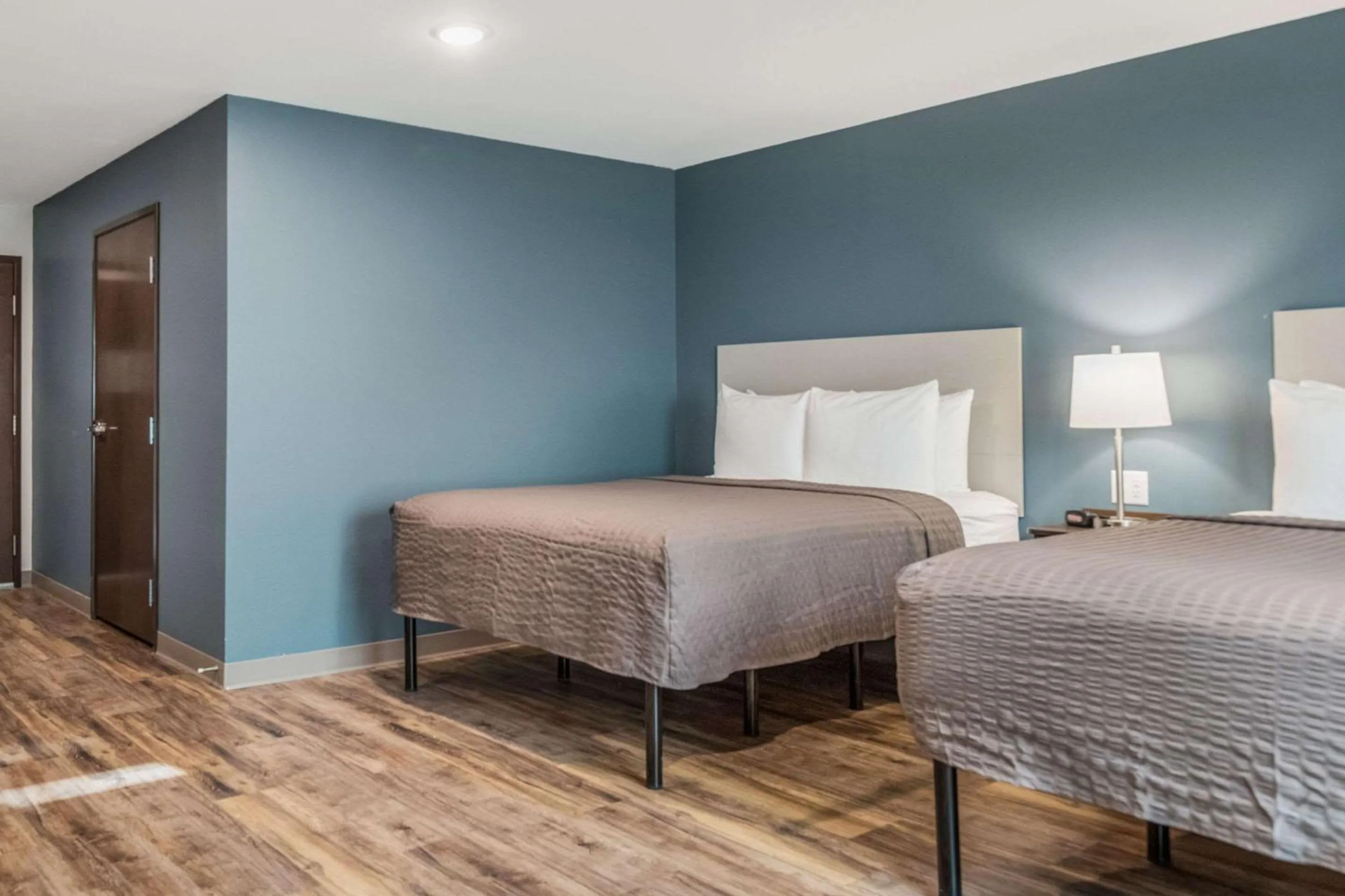 Photo of the whole room, Bed in WoodSpring Suites Greenville Haywood Mall