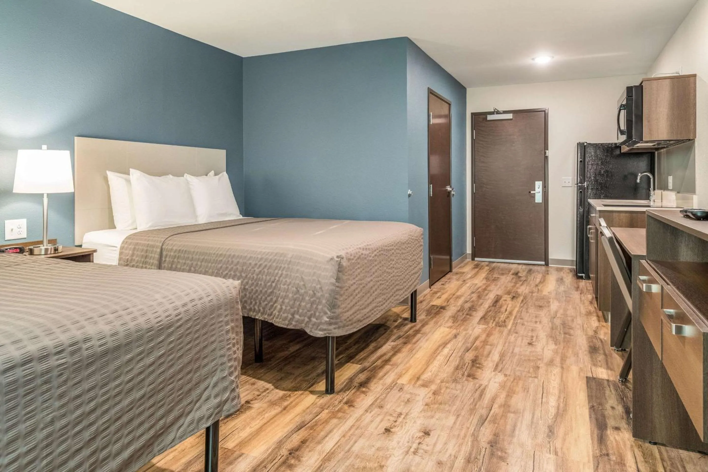 Photo of the whole room, Bed in WoodSpring Suites Greenville Haywood Mall