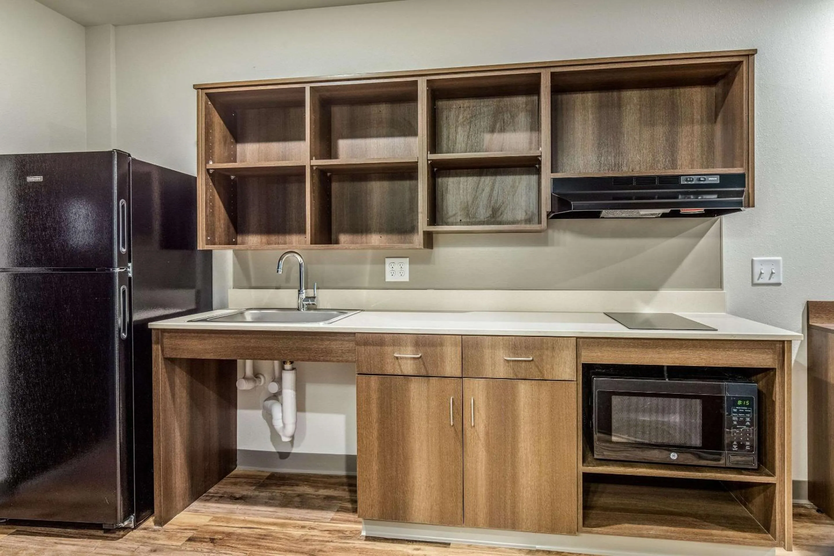 Photo of the whole room in WoodSpring Suites Greenville Haywood Mall