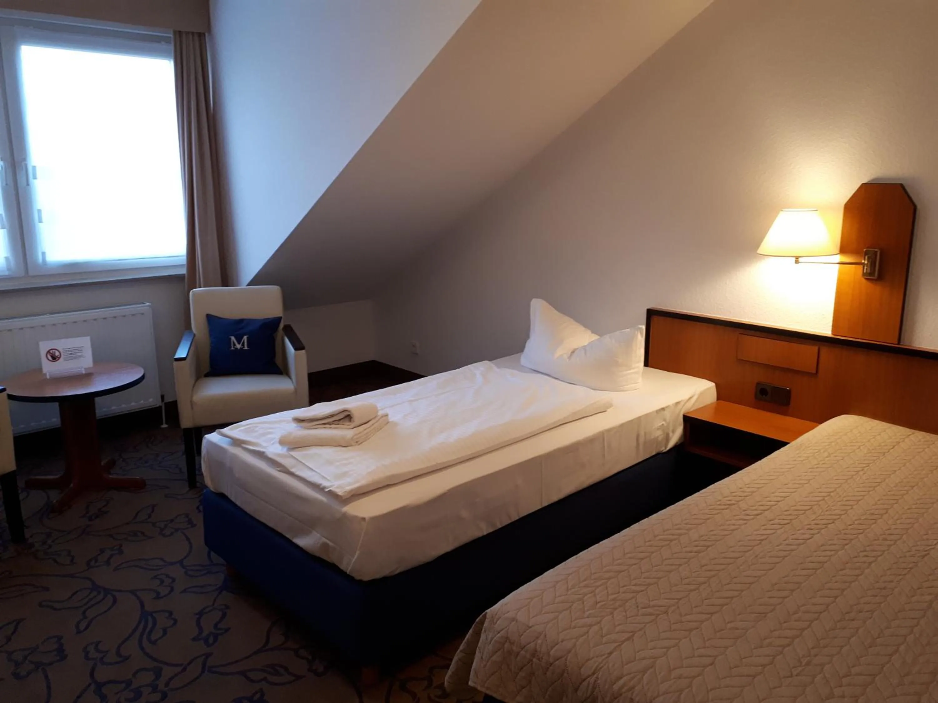 Photo of the whole room, Bed in Hotel Markkleeberger Hof