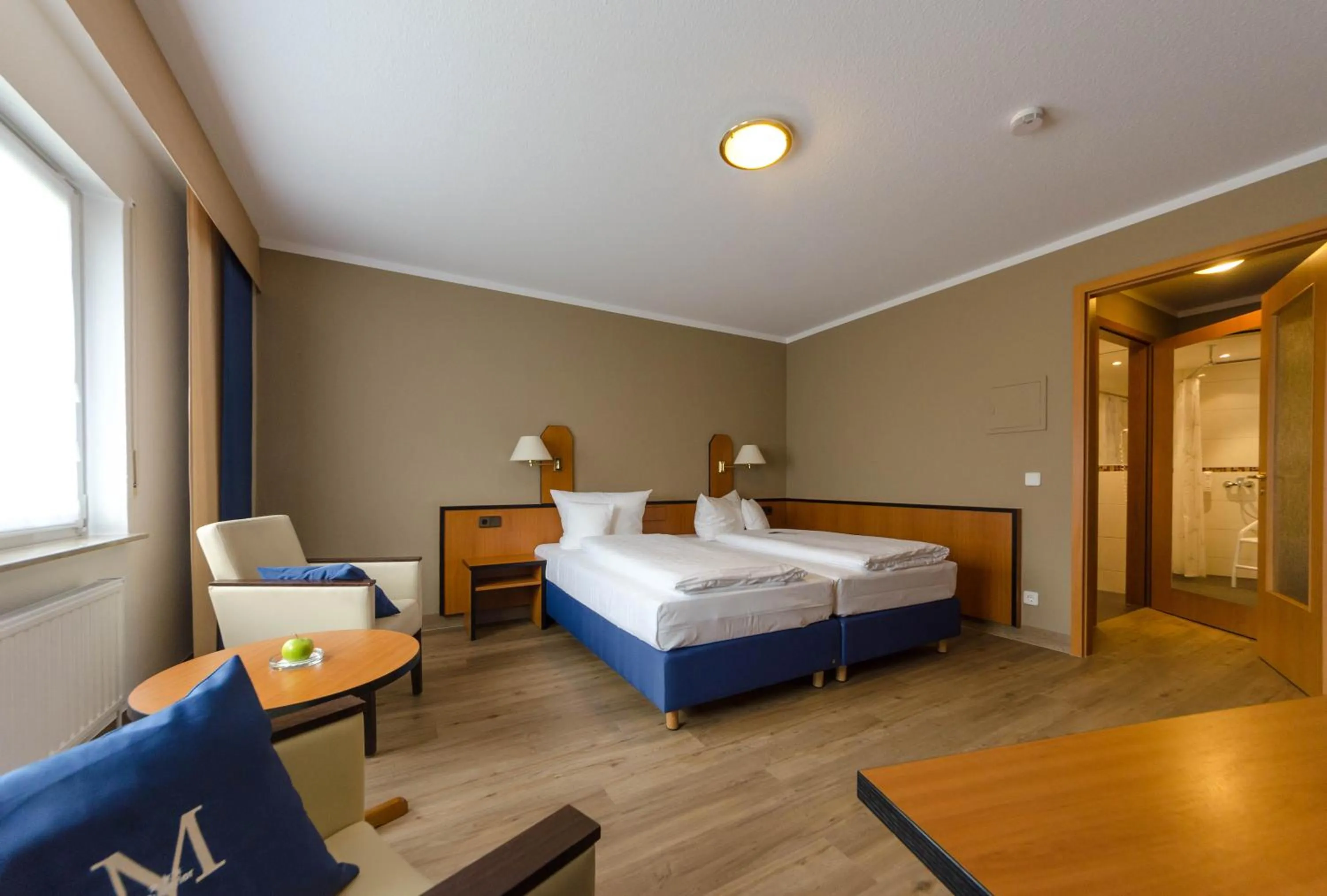 Photo of the whole room, Bed in Hotel Markkleeberger Hof