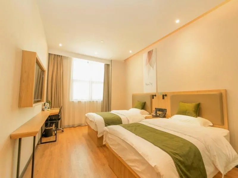 Bed in GreenTree Inn Nanjing Lukou Airport