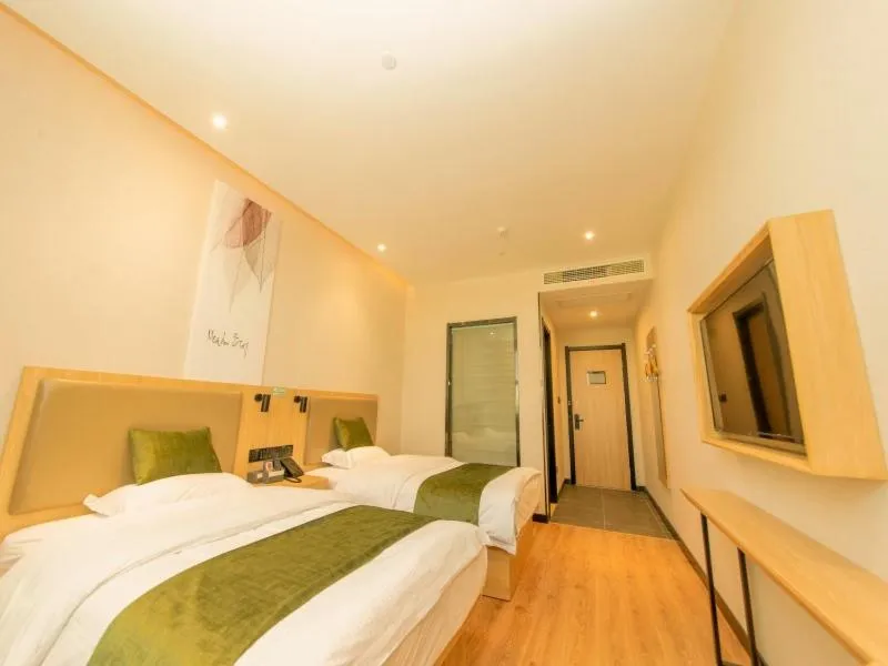 Bed in GreenTree Inn Nanjing Lukou Airport