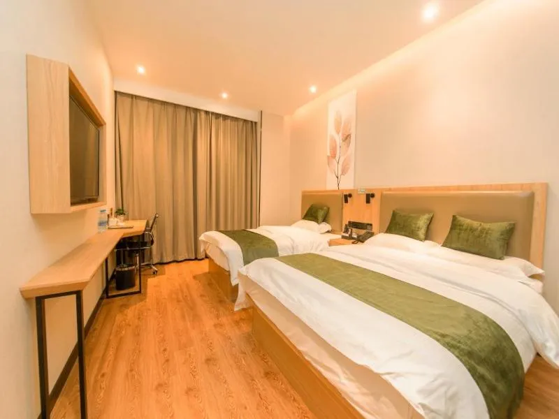 Bed in GreenTree Inn Nanjing Lukou Airport