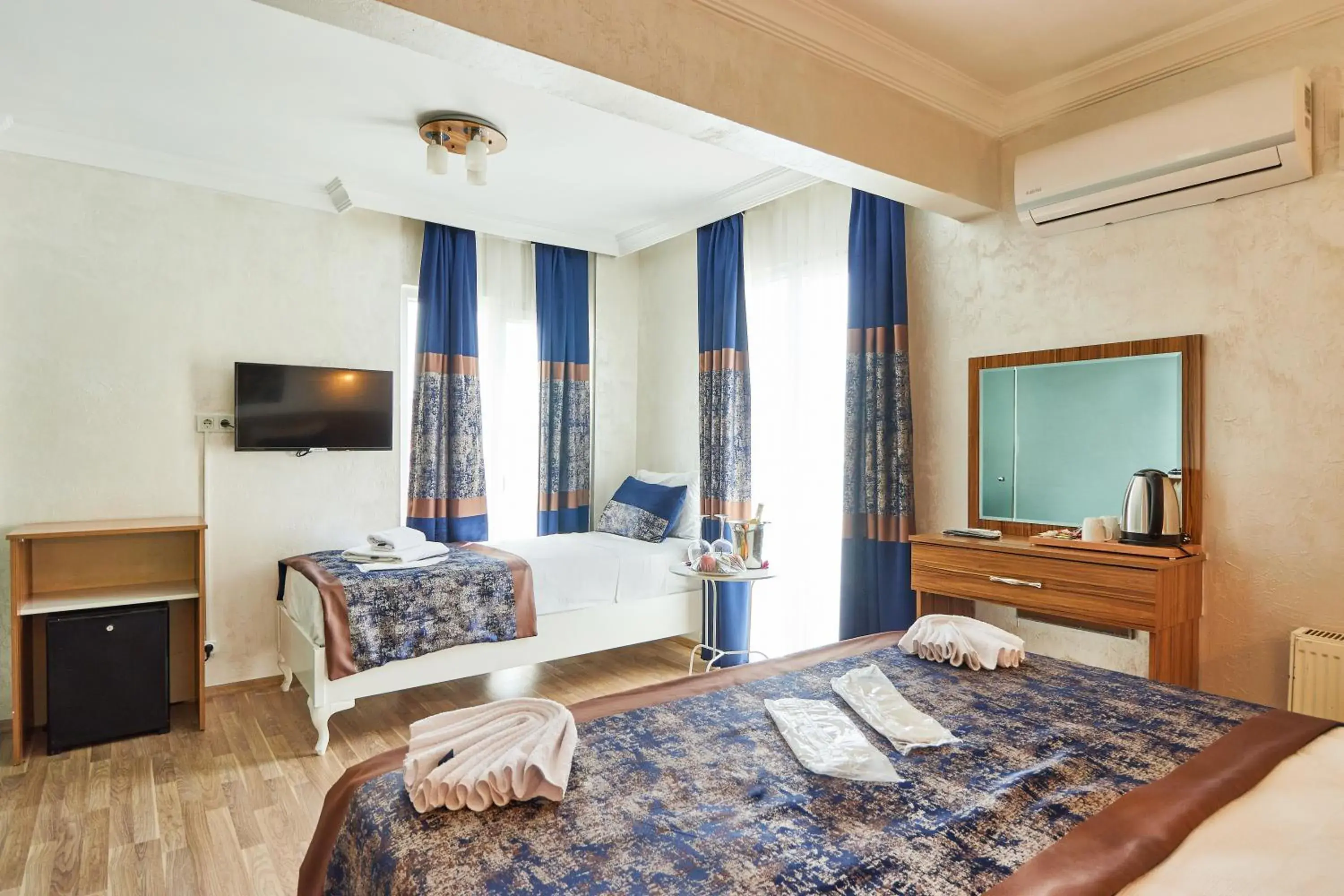 Standard Triple Room in Armar Hotel Standard Triple Room in Armar Hotel