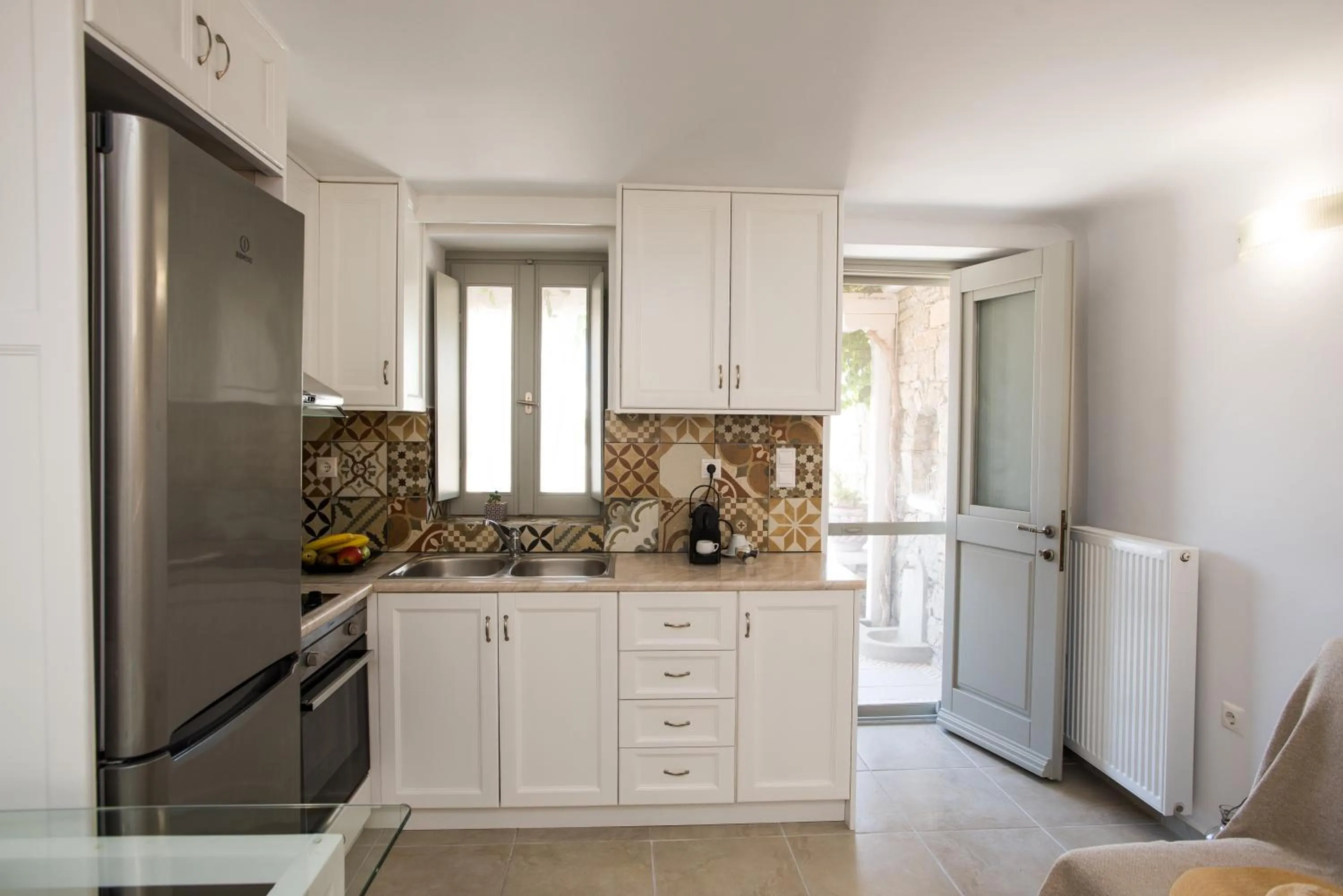 Kitchen or kitchenette in Mykonos Dot Apartments
