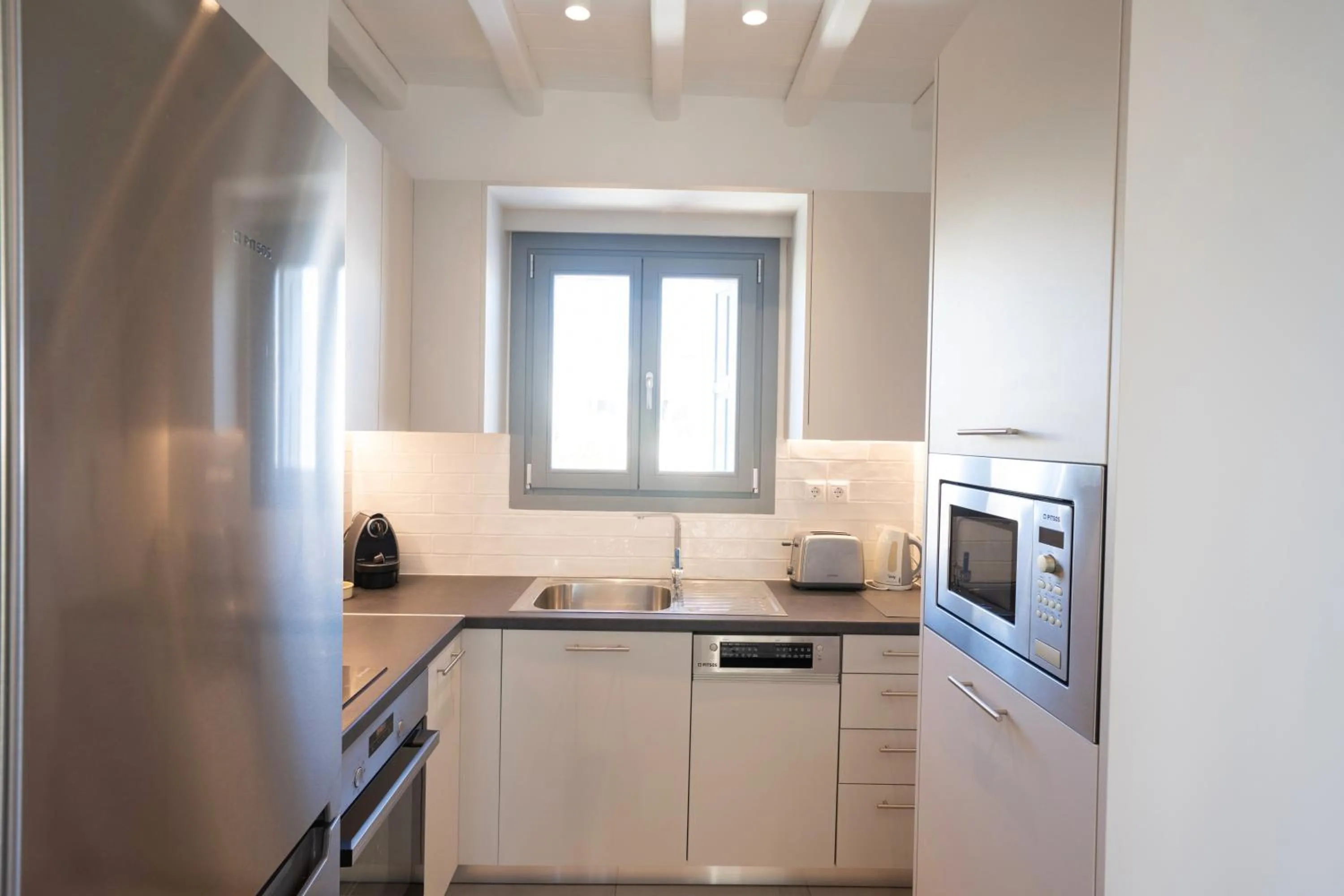Kitchen or kitchenette in Mykonos Dot Apartments