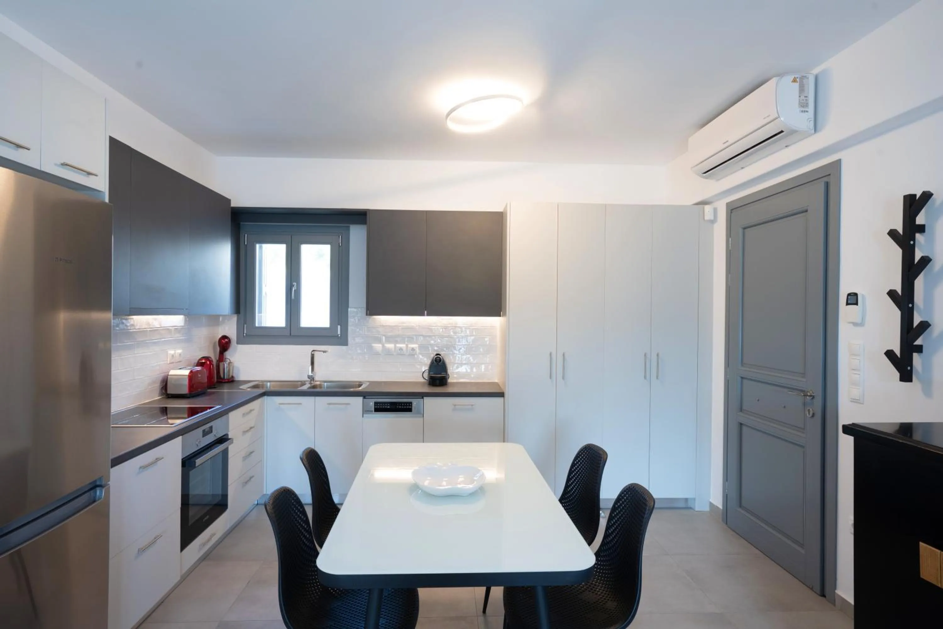 Kitchen or kitchenette in Mykonos Dot Apartments