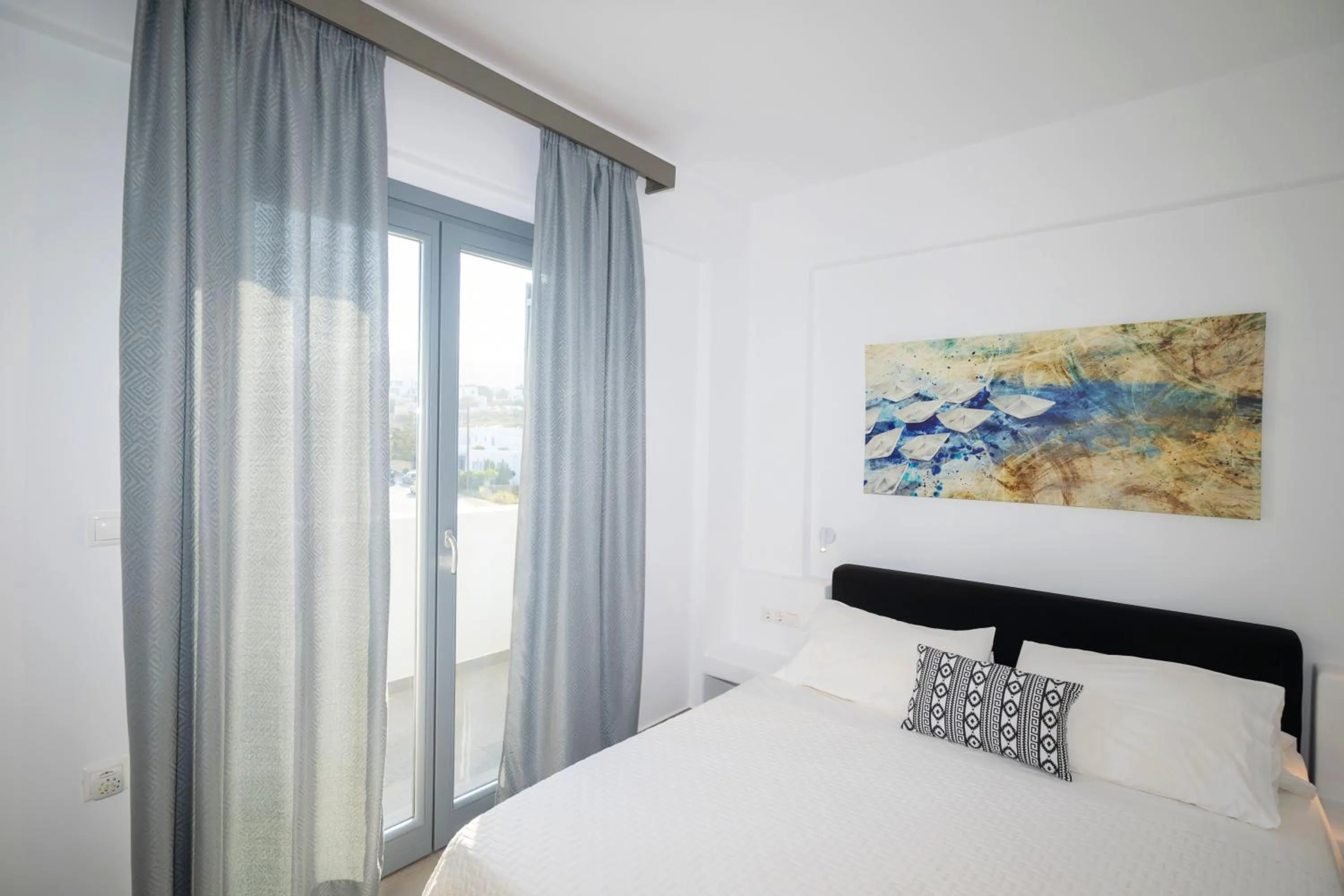 Bed in Mykonos Dot Apartments