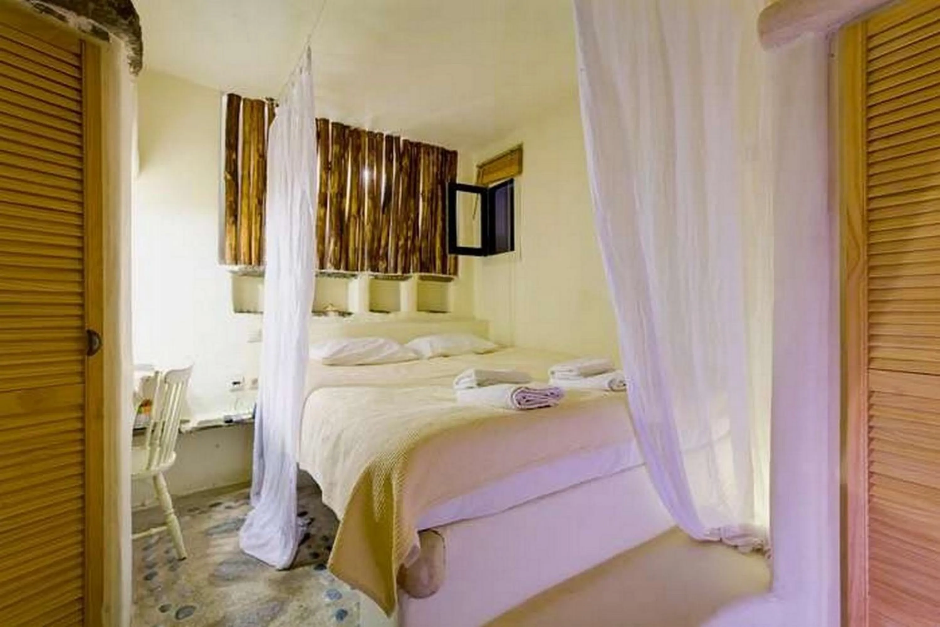 Bed in Rania Apartments Sea View