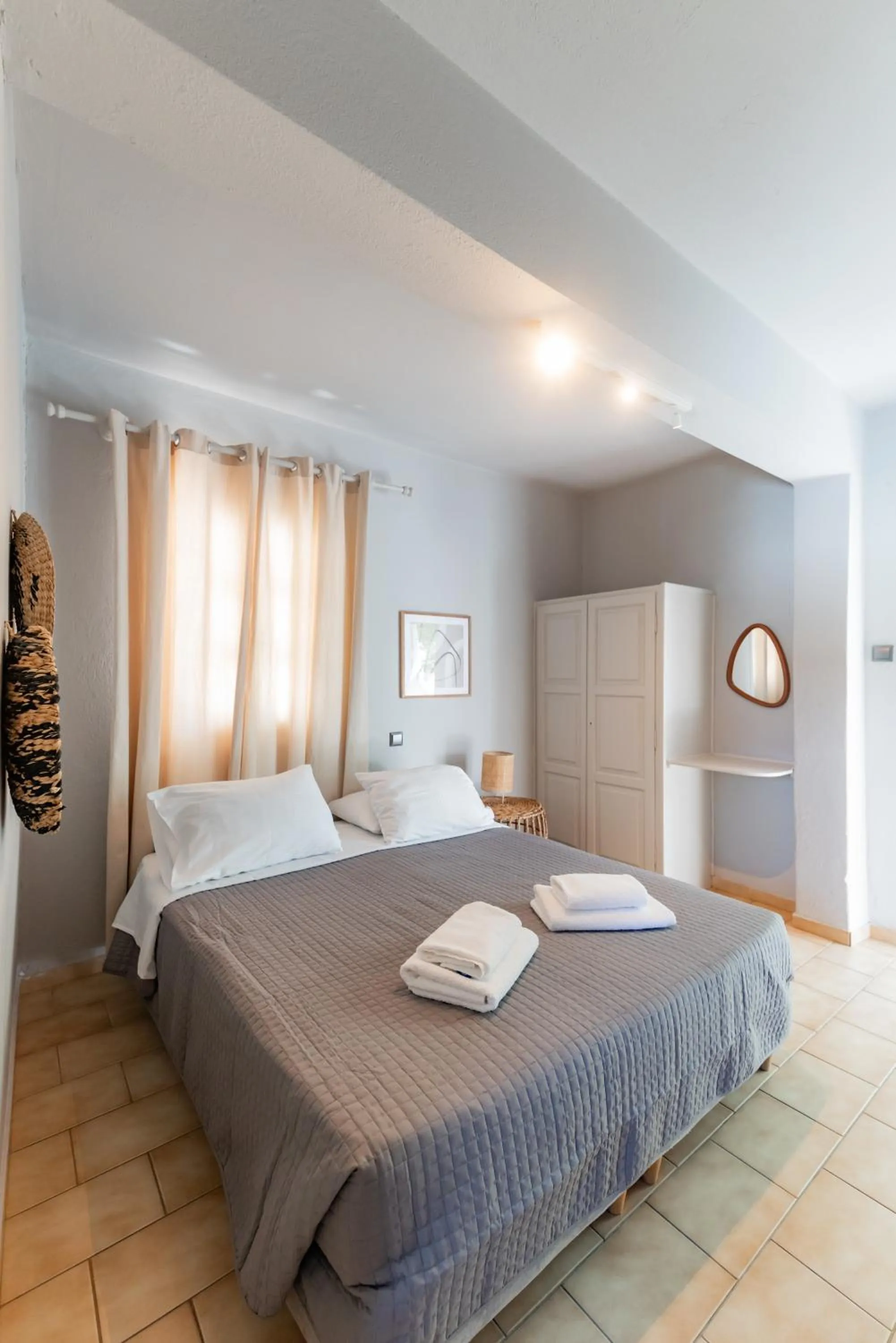 Bed in Rania Apartments Sea View