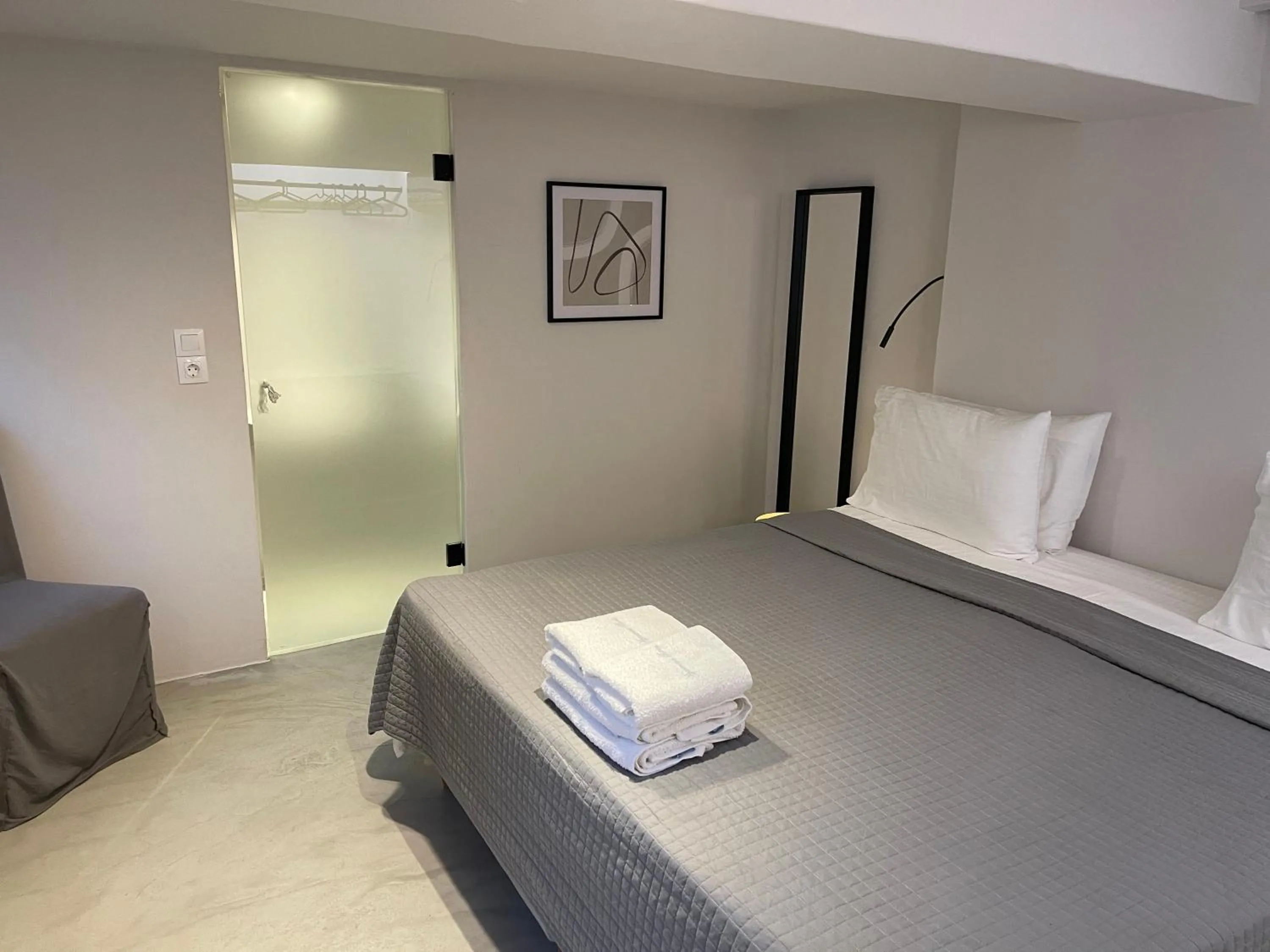 Bed in Rania Apartments Sea View