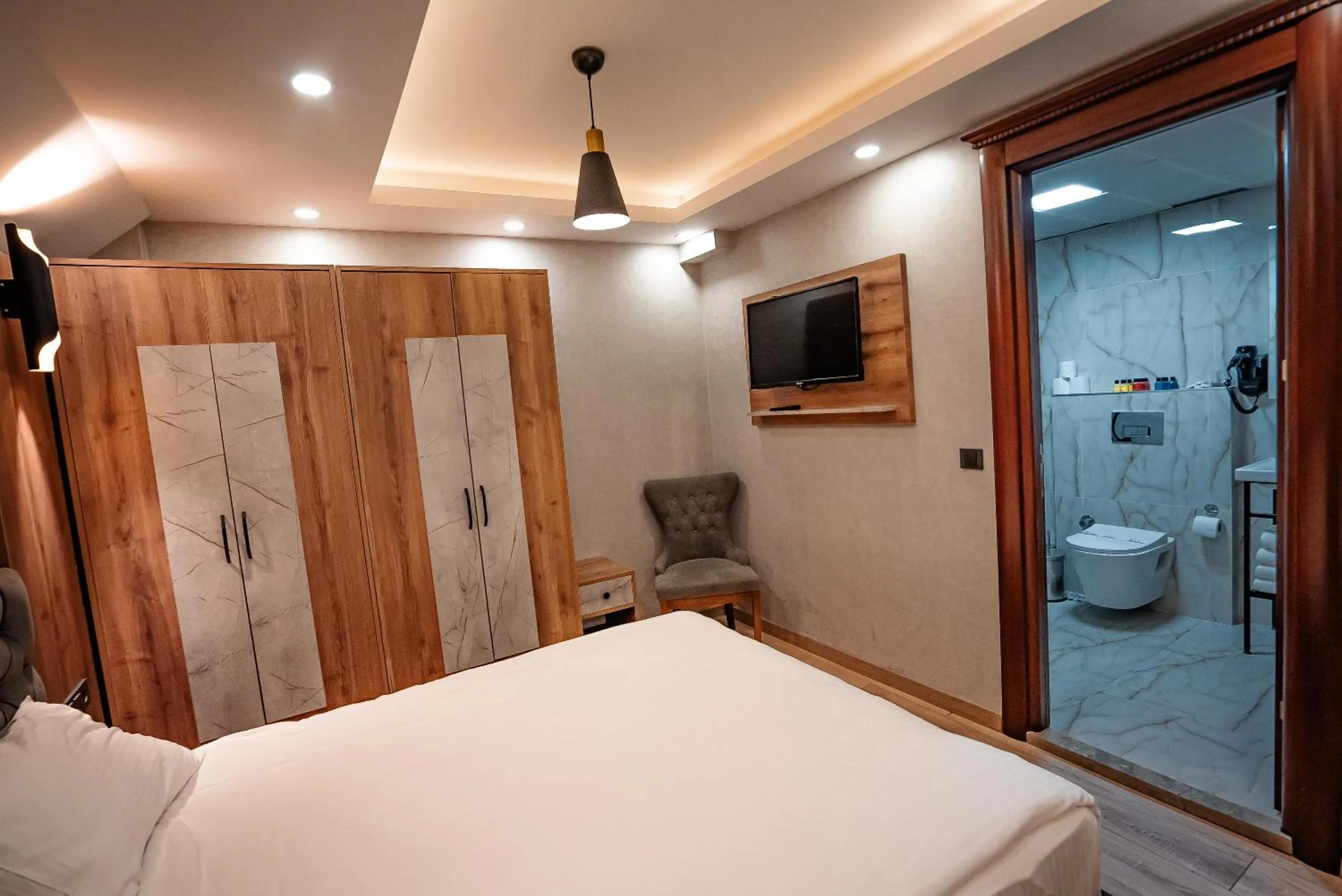 Bedroom, Bed in World Heritage Center Hotel