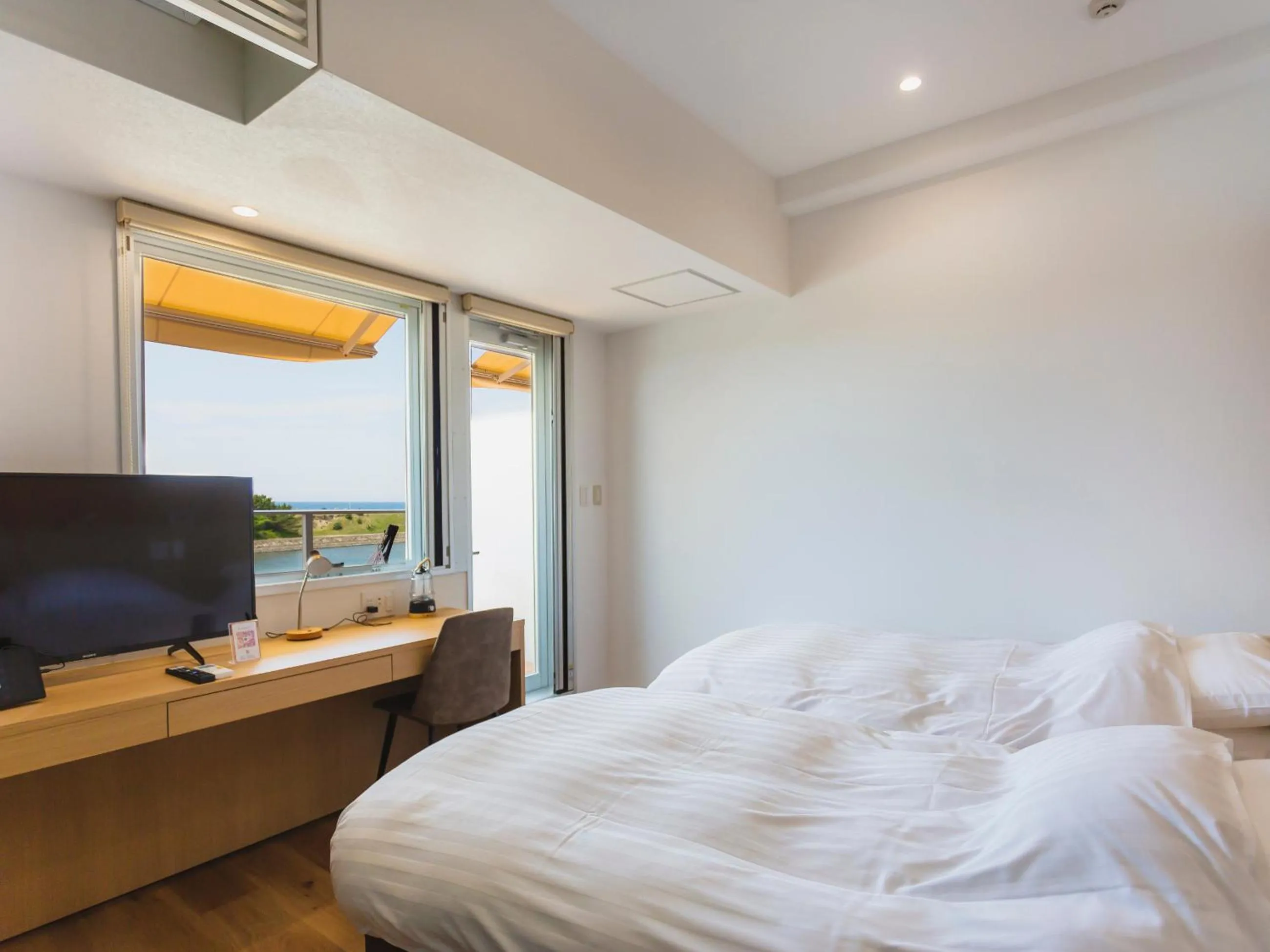 Bed in Fukiagehama Field Hotel